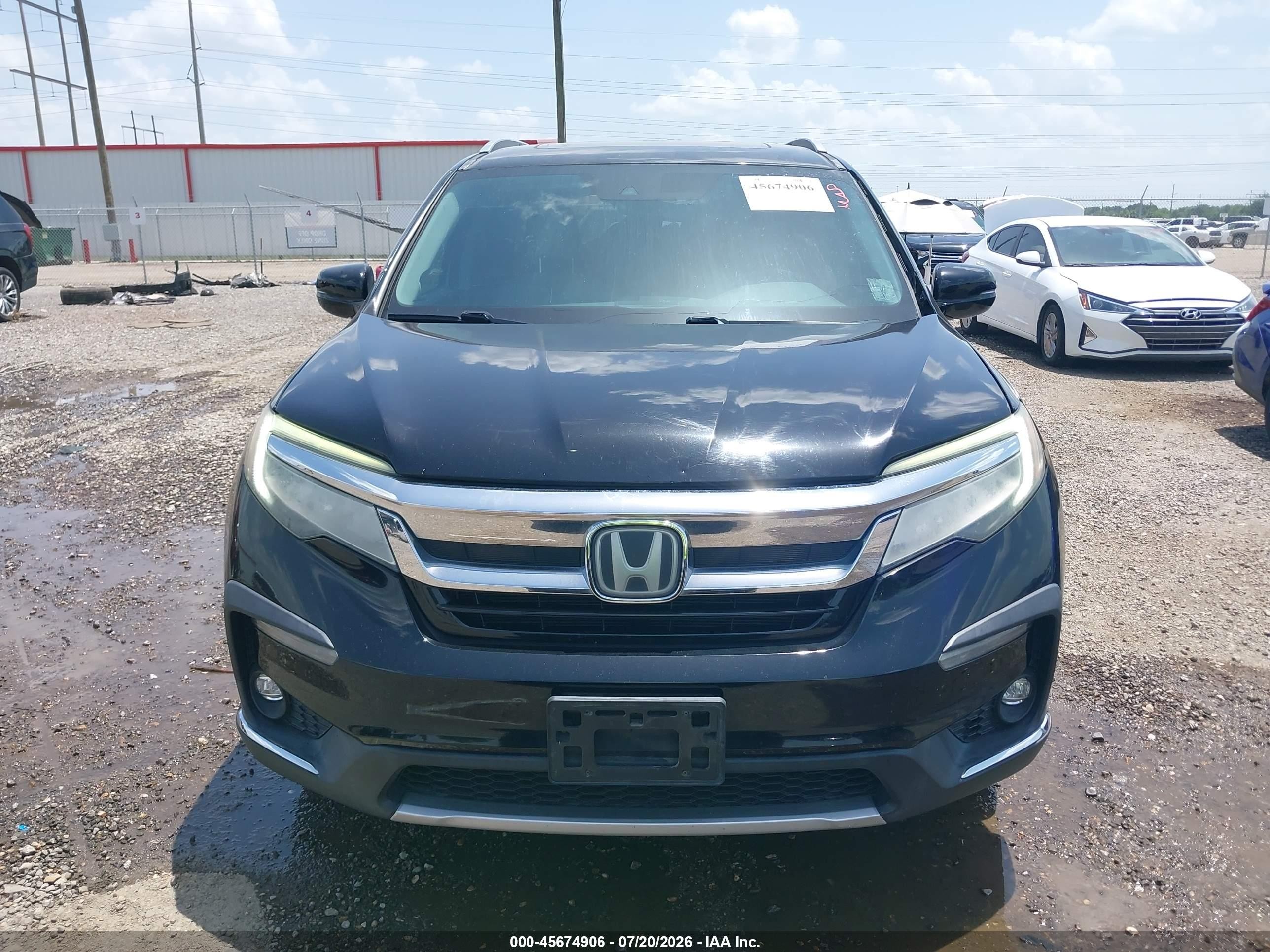 2019 Honda Pilot Touring Черный vin: 5FNYF5H99KB014257