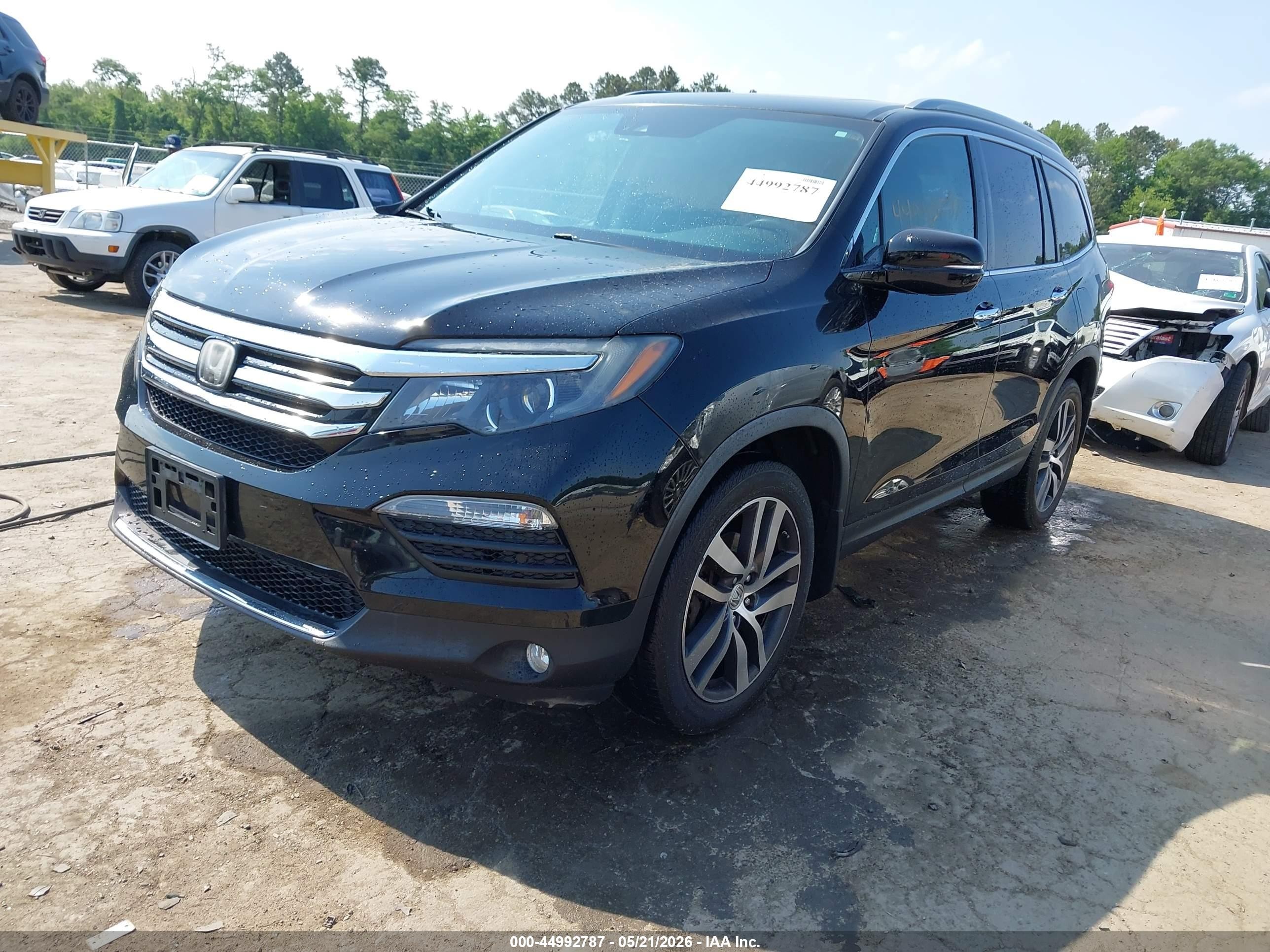 2017 Honda Pilot Elite Черный vin: 5FNYF6H01HB089244