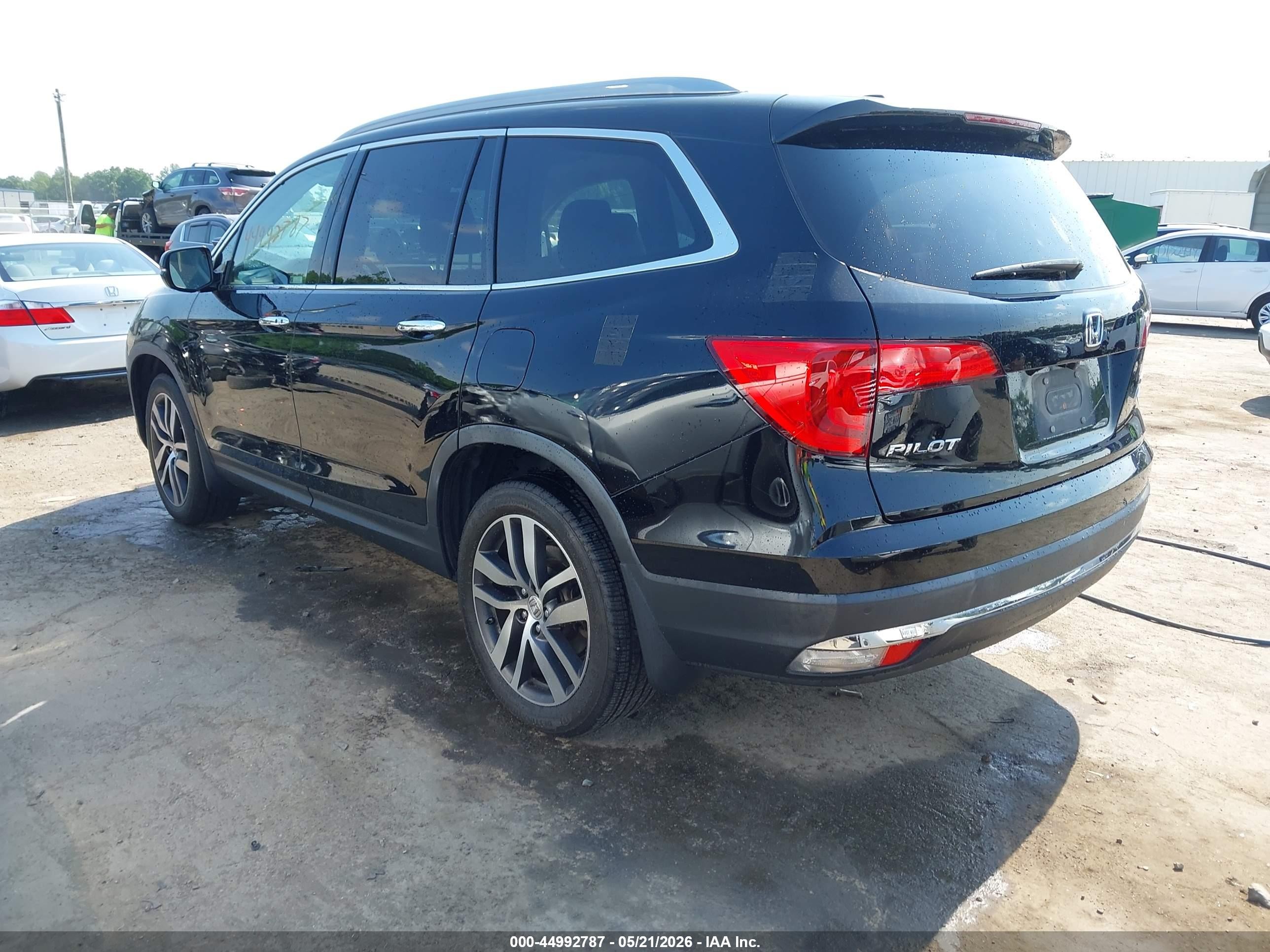 2017 Honda Pilot Elite Черный vin: 5FNYF6H01HB089244