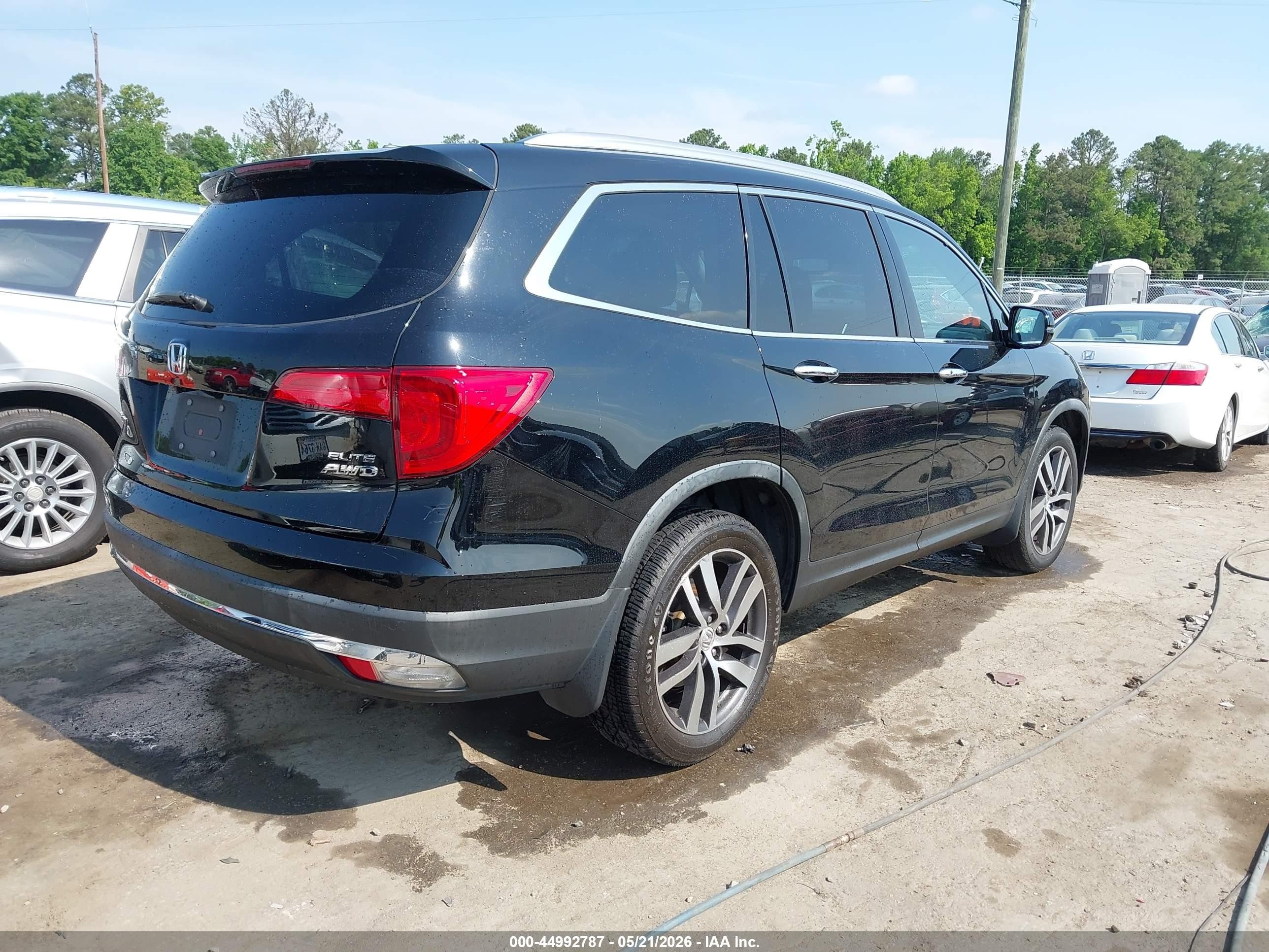2017 Honda Pilot Elite Черный vin: 5FNYF6H01HB089244