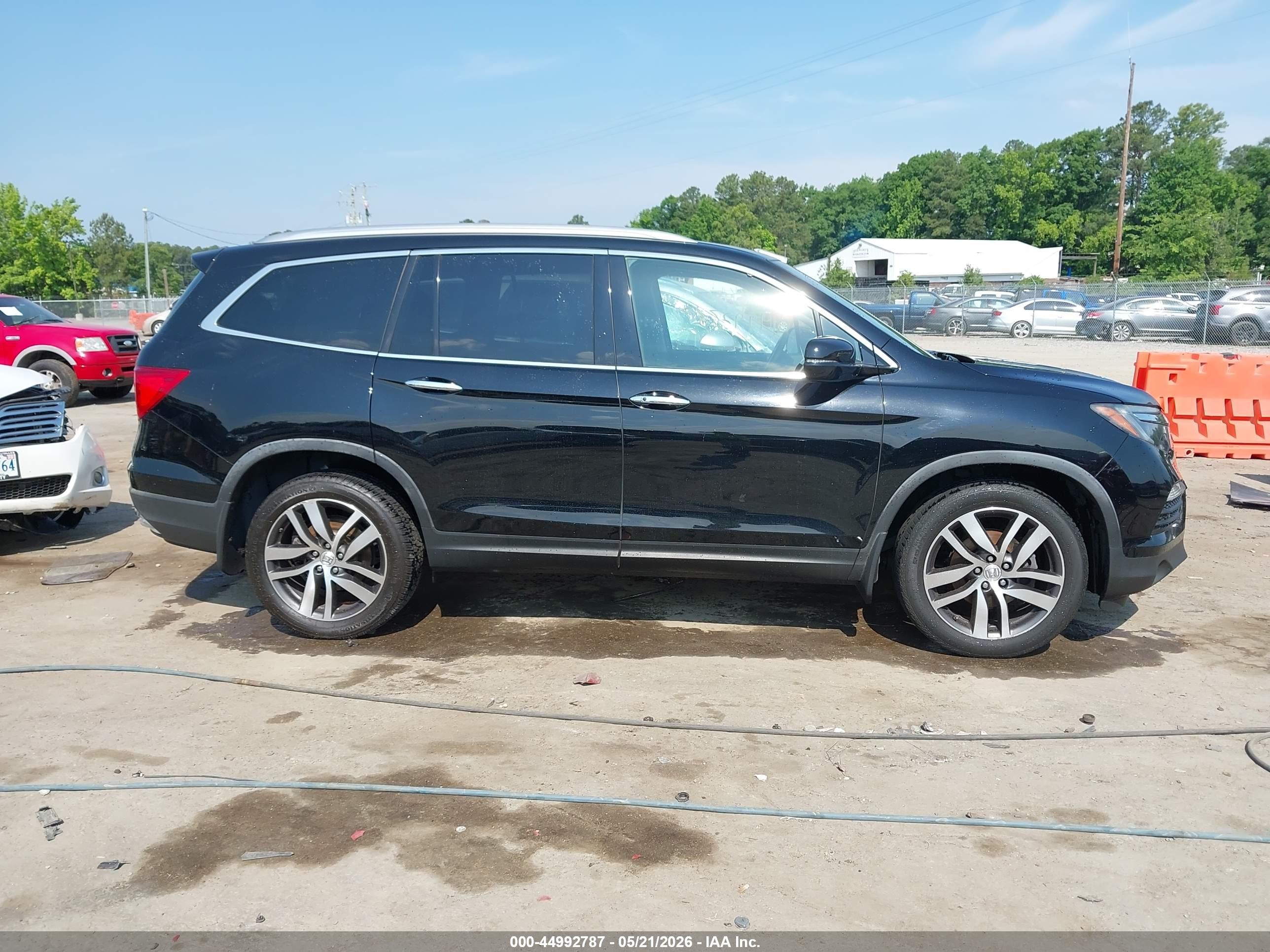 2017 Honda Pilot Elite Черный vin: 5FNYF6H01HB089244
