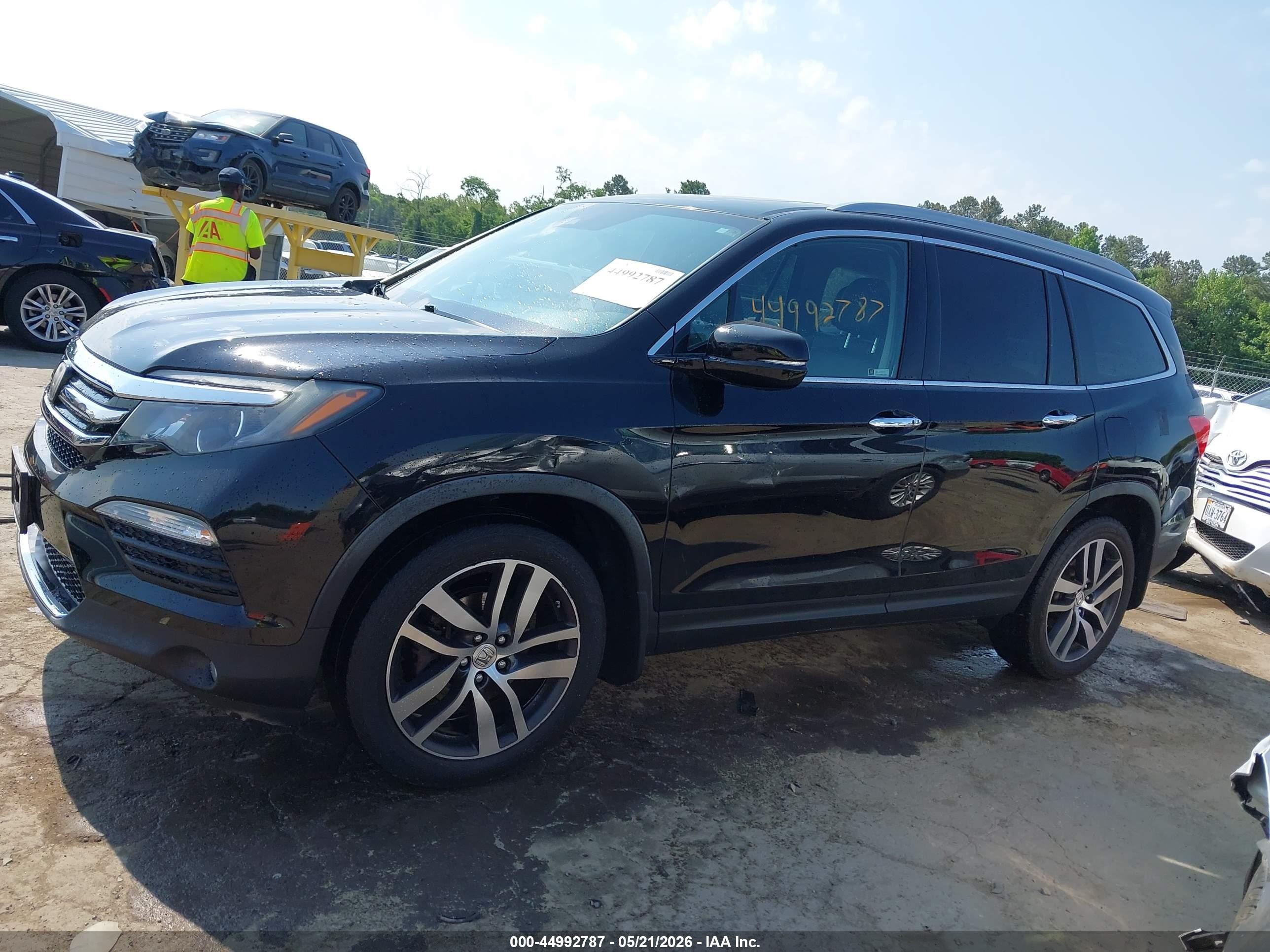 2017 Honda Pilot Elite Черный vin: 5FNYF6H01HB089244
