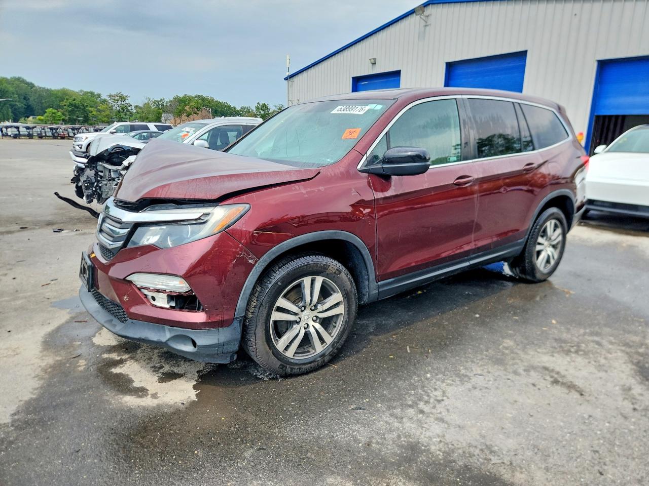 2018 Honda Pilot Exln Burgundy vin: 5FNYF6H77JB020478