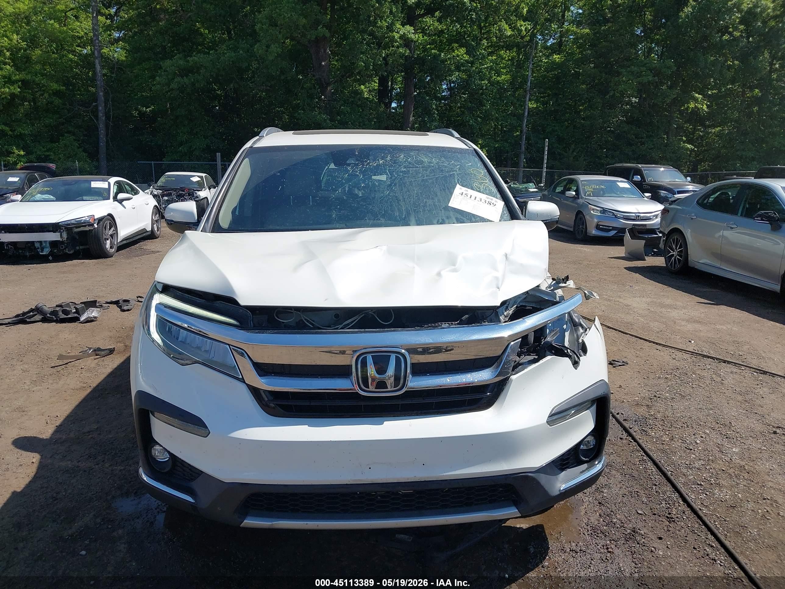2019 Honda Pilot Touring White vin: 5FNYF6H97KB019026