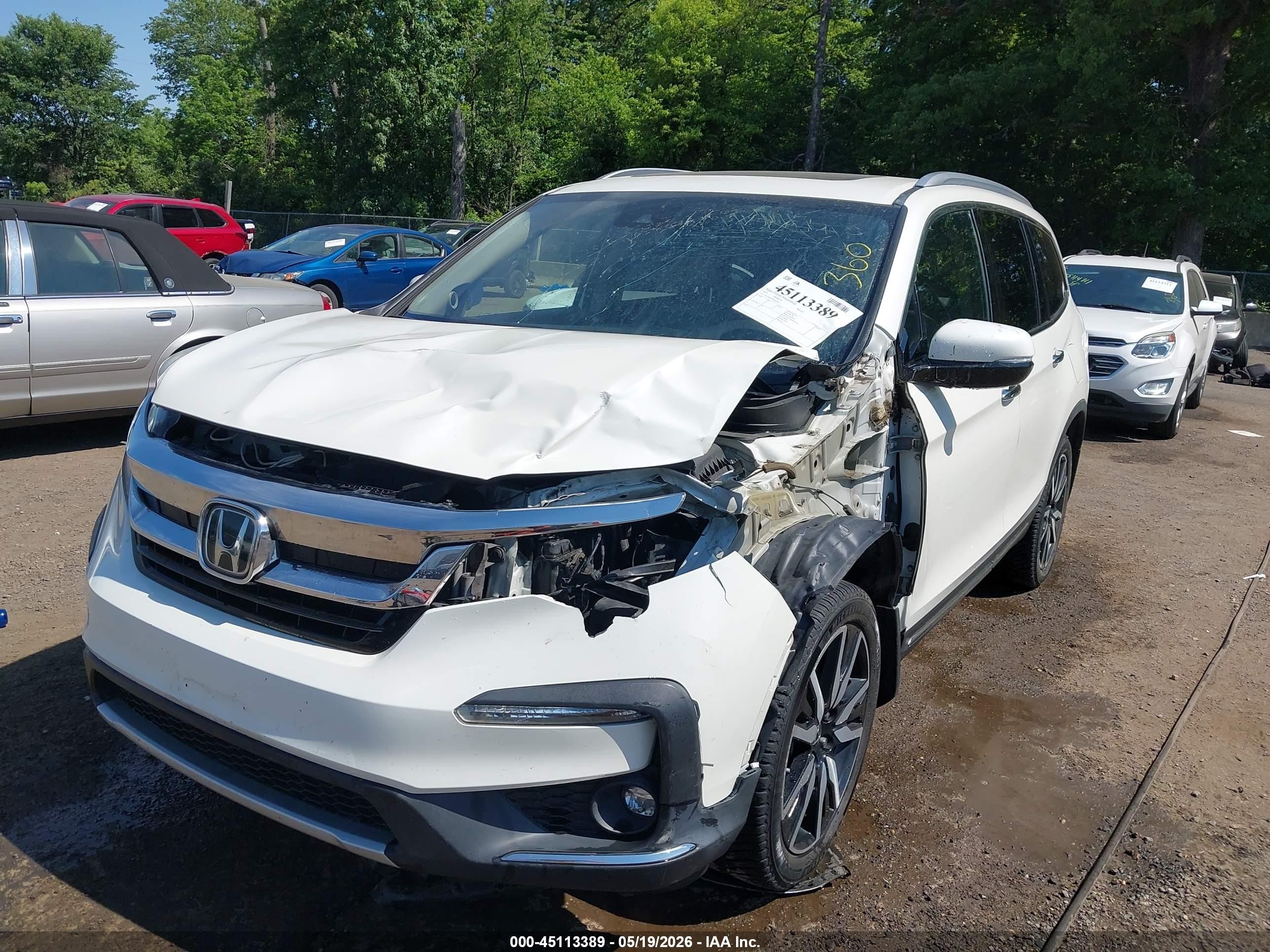 2019 Honda Pilot Touring White vin: 5FNYF6H97KB019026