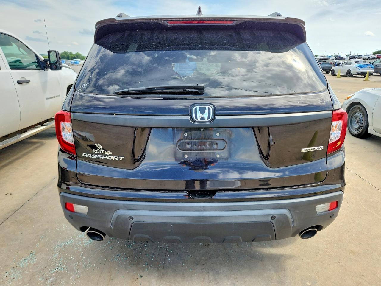 2019 Honda Passport Touring Черный vin: 5FNYF7H95KB000819