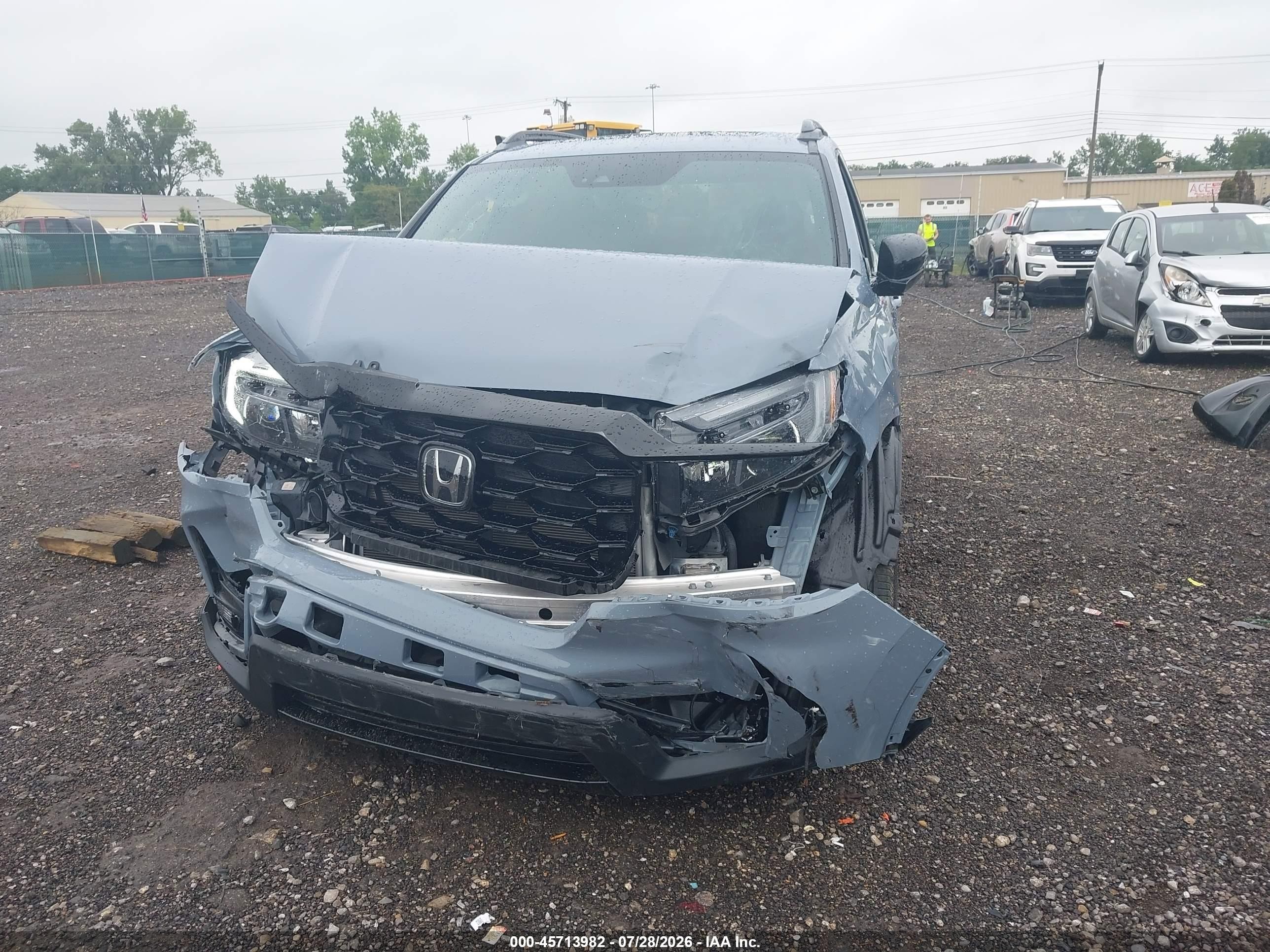 2023 Honda Passport Awd Elite Blue vin: 5FNYF8H09PB037225