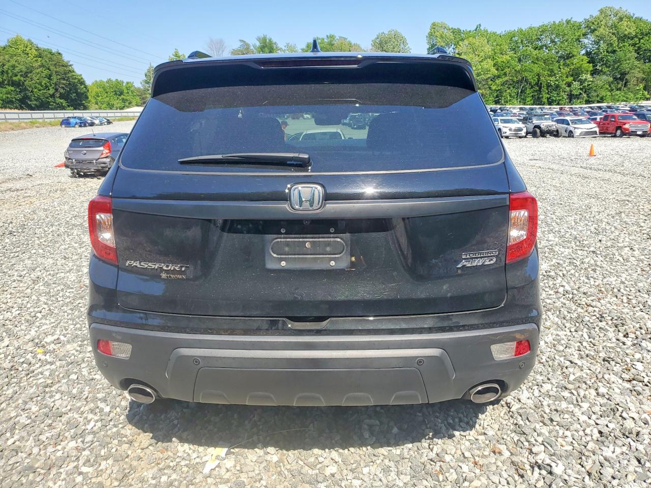 2021 Honda Passport Touring Black vin: 5FNYF8H94MB041046