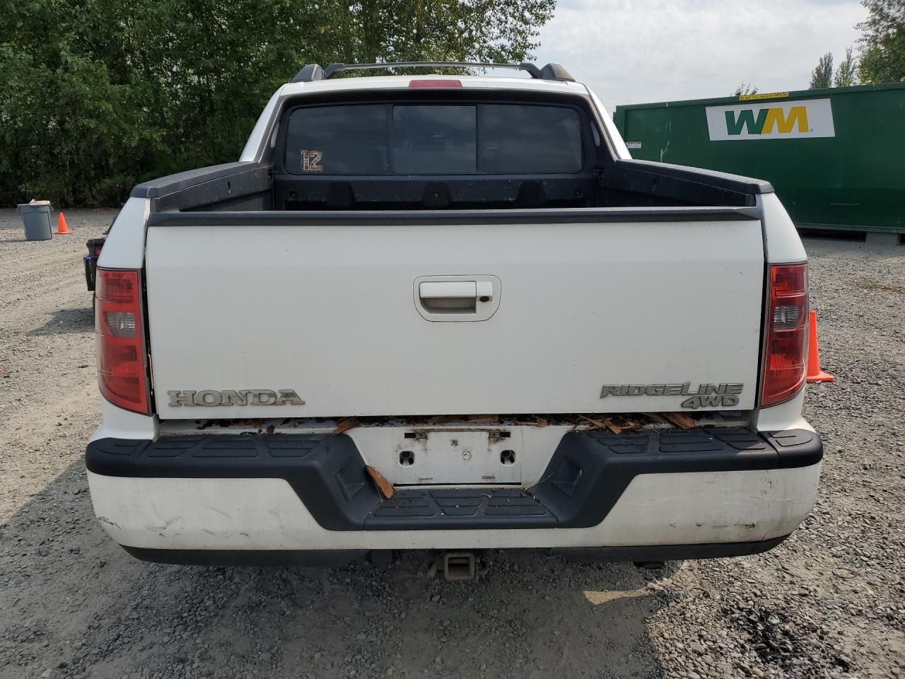 2009 Honda Ridgeline Rtl White vin: 5FPYK16509B105827 Damage: Rear Bumper, Light Scratch, 5 To 6 Inches