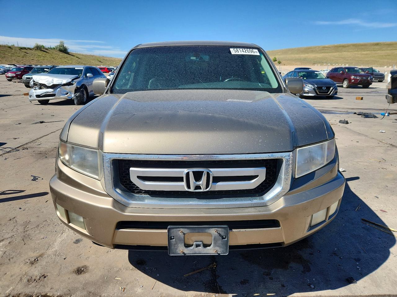 2009 Honda Ridgeline Rtl Tan vin: 5FPYK16539B109418