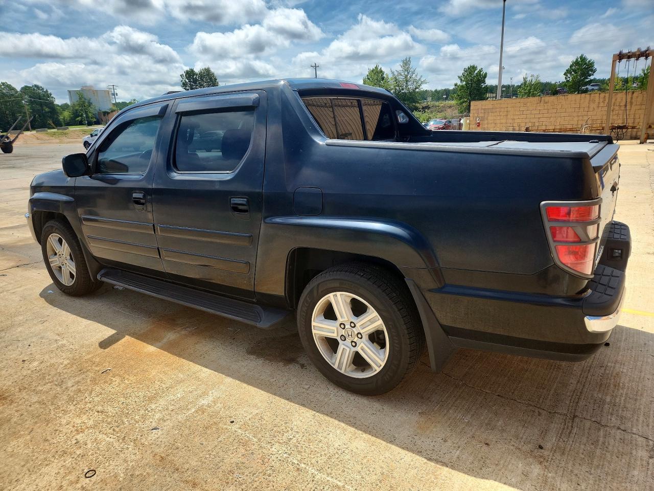 2011 Honda Ridgeline Rtl Black vin: 5FPYK1F50BB009847
