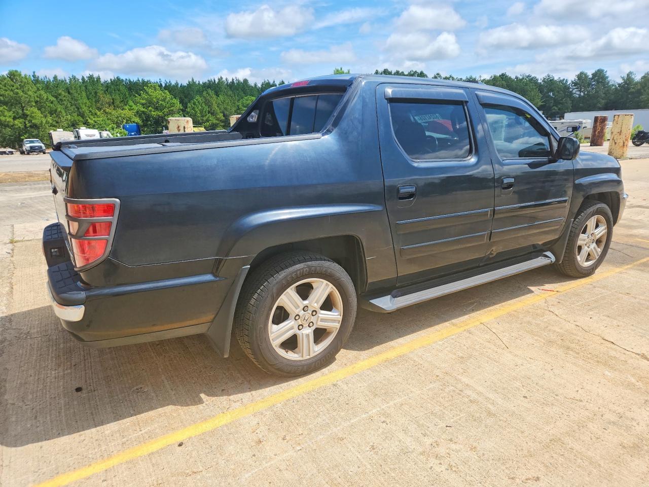 2011 Honda Ridgeline Rtl Black vin: 5FPYK1F50BB009847