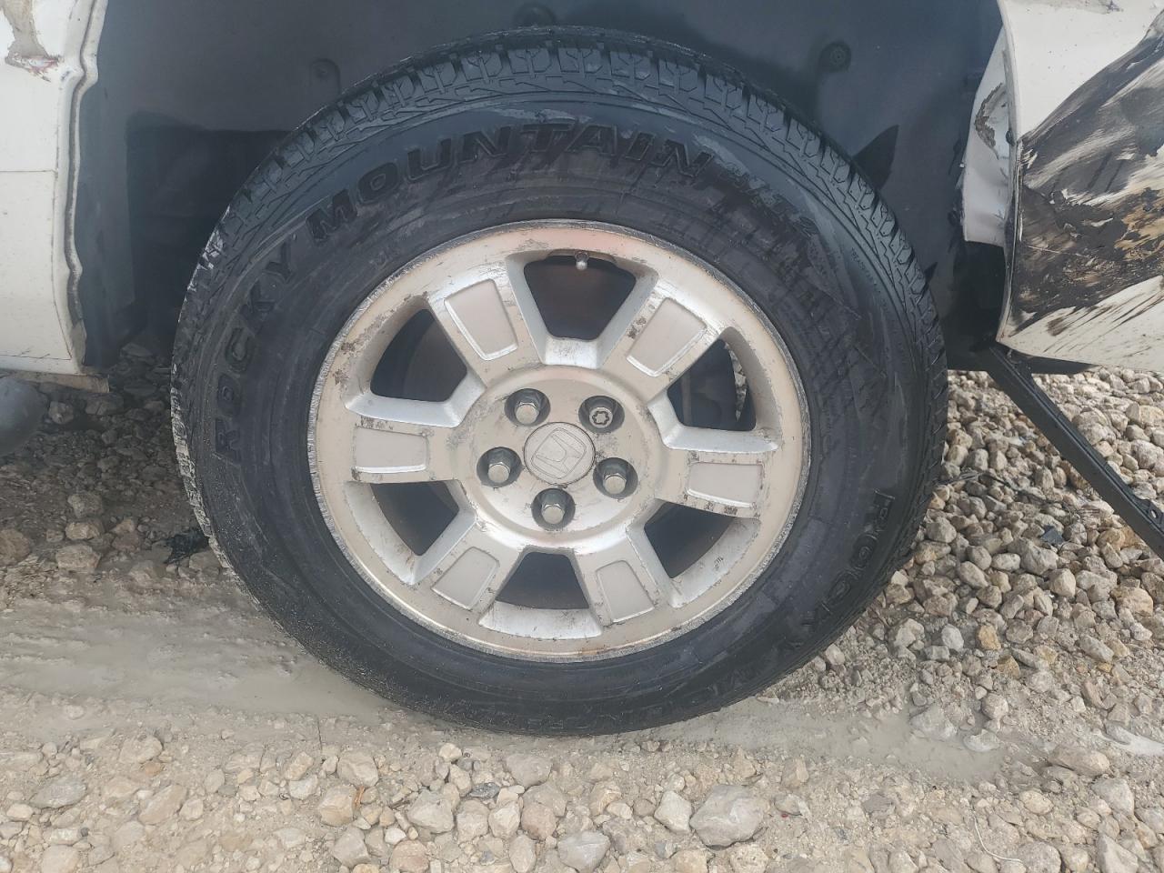 2012 Honda Ridgeline Rtl White vin: 5FPYK1F50CB452792 Damage: Left Rear Wheel, Curb Rash, > 12 Inches