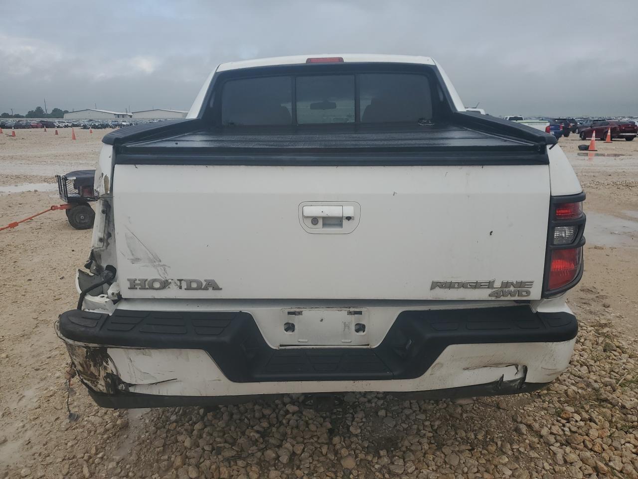 2012 Honda Ridgeline Rtl White vin: 5FPYK1F50CB452792 Damage: Rear Bumper Reinforcement, Broken, Replacement Required