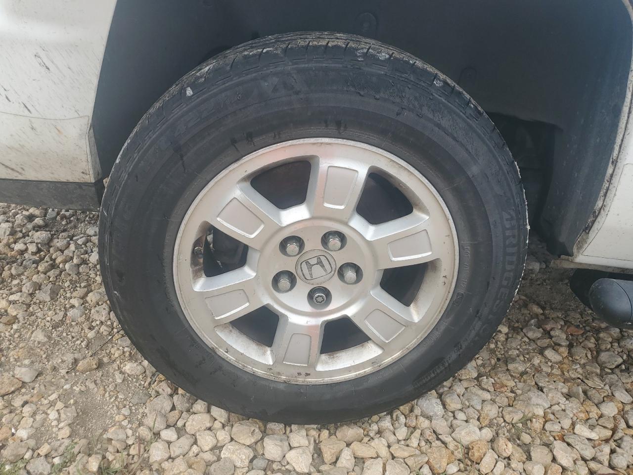 2012 Honda Ridgeline Rtl White vin: 5FPYK1F50CB452792 Damage: Right Rear Wheel, Curb Rash, > 12 Inches
