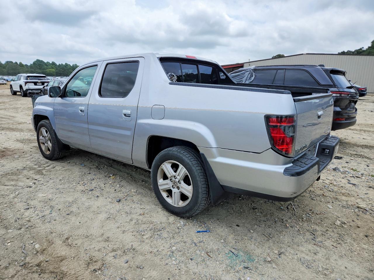 2013 Honda Ridgeline Rtl Silver vin: 5FPYK1F50DB006191