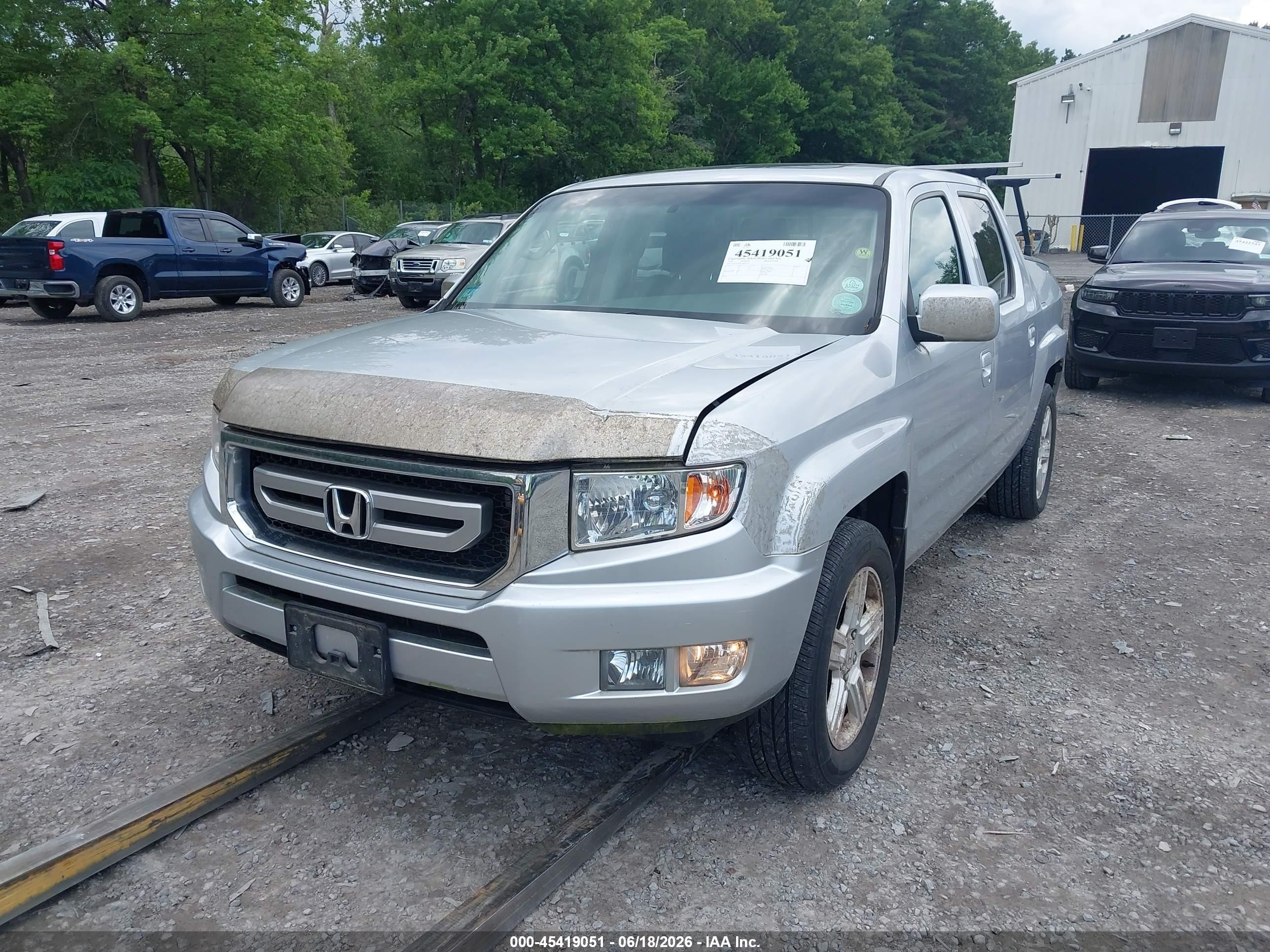 2010 Honda Ridgeline Rtl Silver vin: 5FPYK1F51AB007717