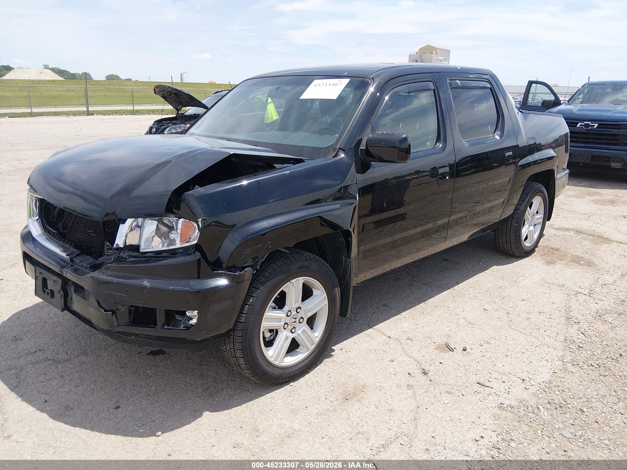 2011 Honda Ridgeline Rtl Black vin: 5FPYK1F51BB005371