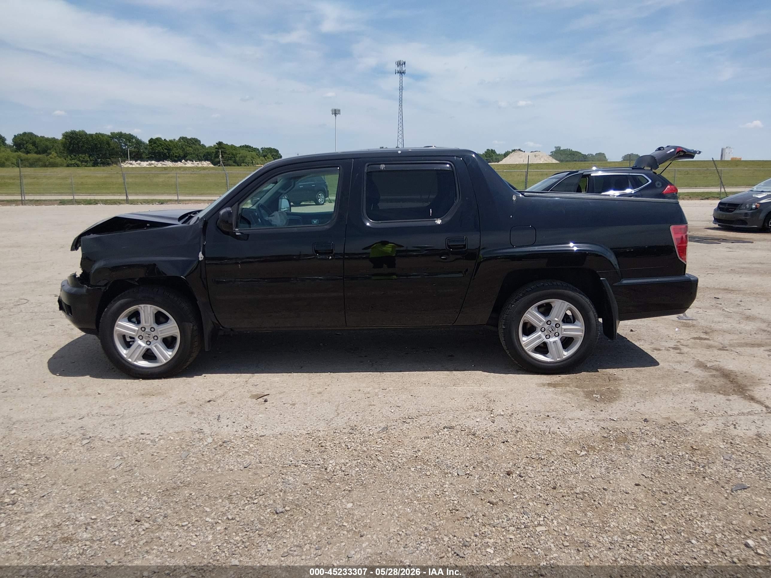 2011 Honda Ridgeline Rtl Black vin: 5FPYK1F51BB005371