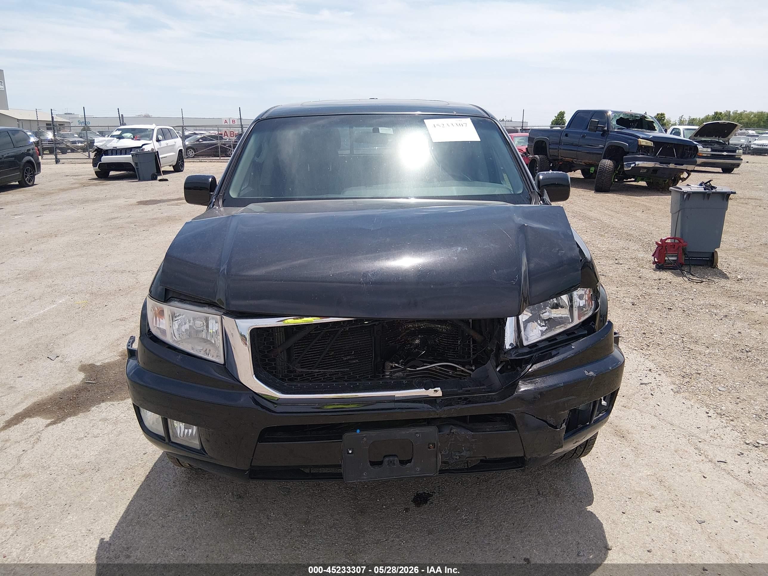 2011 Honda Ridgeline Rtl Black vin: 5FPYK1F51BB005371