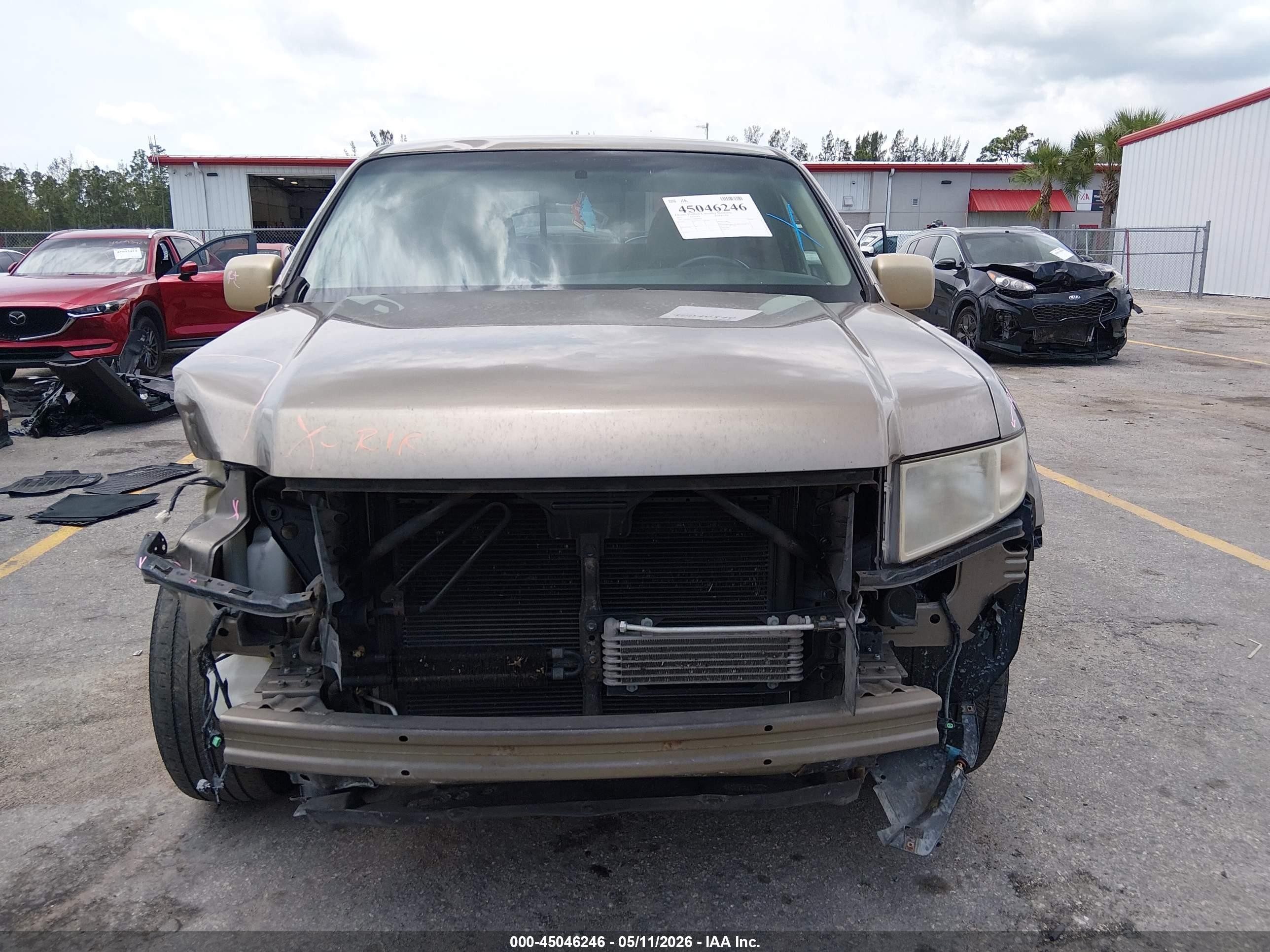 2011 Honda Ridgeline Rtl Beige vin: 5FPYK1F51BB009985