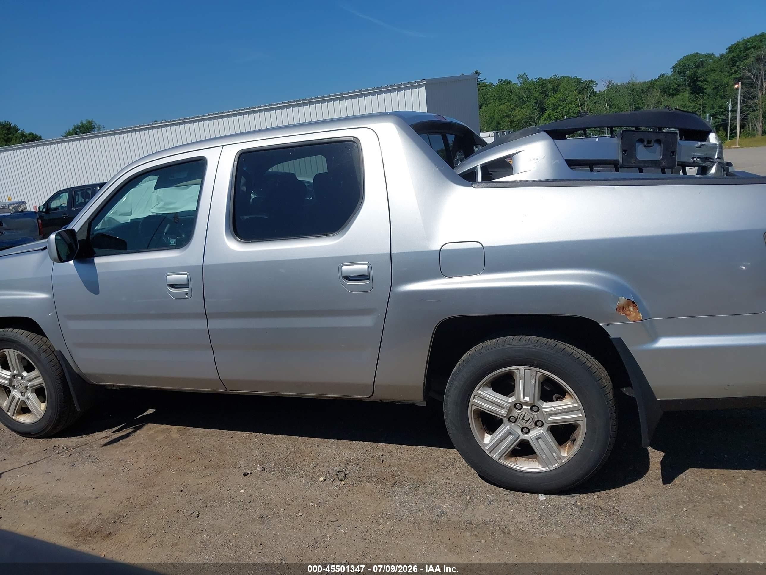 2012 Honda Ridgeline Rtl Silver vin: 5FPYK1F51CB452218