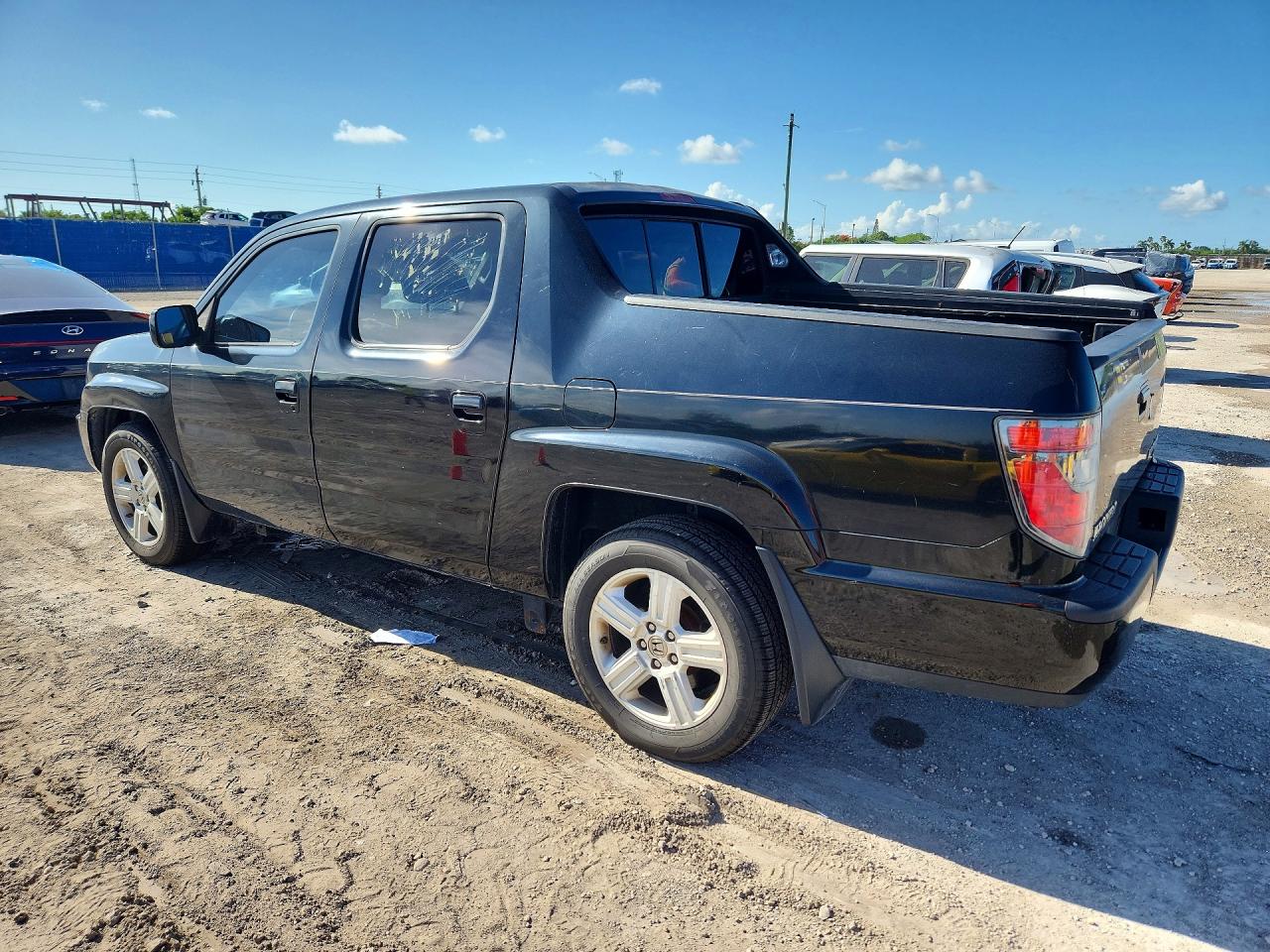 2012 Honda Ridgeline Rtl Black vin: 5FPYK1F51CB453787