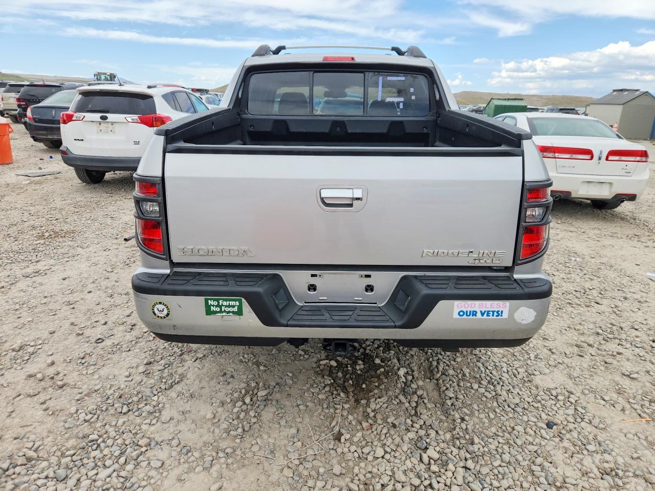 2014 Honda Ridgeline Rtl Silver vin: 5FPYK1F51EB012857