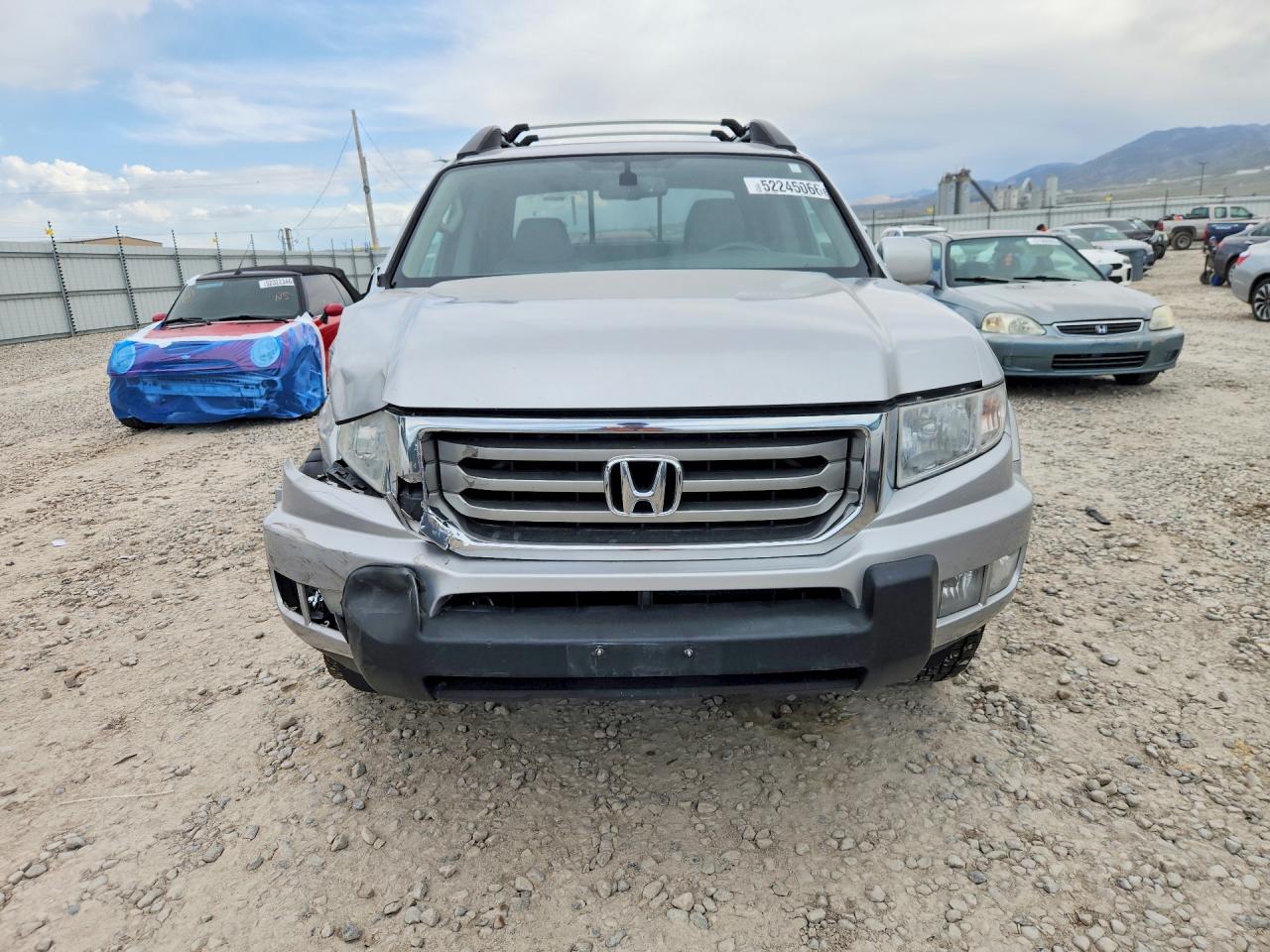 2014 Honda Ridgeline Rtl Silver vin: 5FPYK1F51EB012857