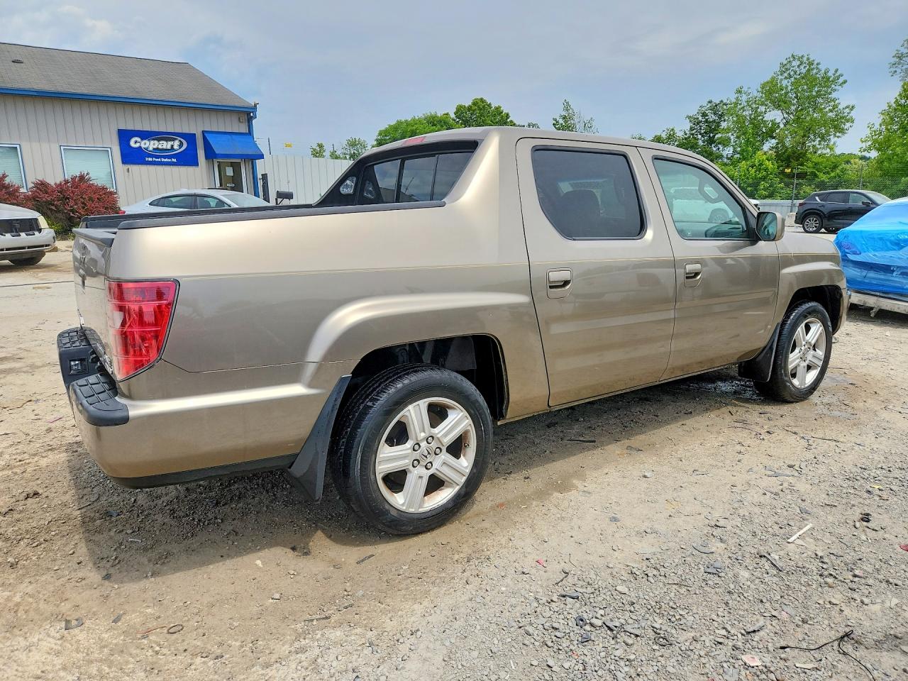 2011 Honda Ridgeline Rtl Tan vin: 5FPYK1F52BB002480