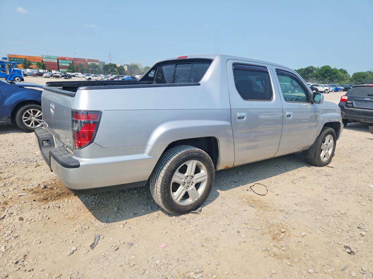 2012 Hond Ridgeline Silver vin: 5FPYK1F52CB454365