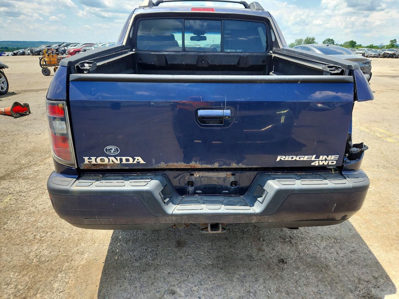 2014 Honda Ridgeline Rtl Blue vin: 5FPYK1F54EB001948