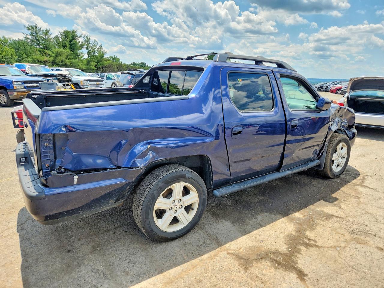 2014 Honda Ridgeline Rtl Blue vin: 5FPYK1F54EB001948