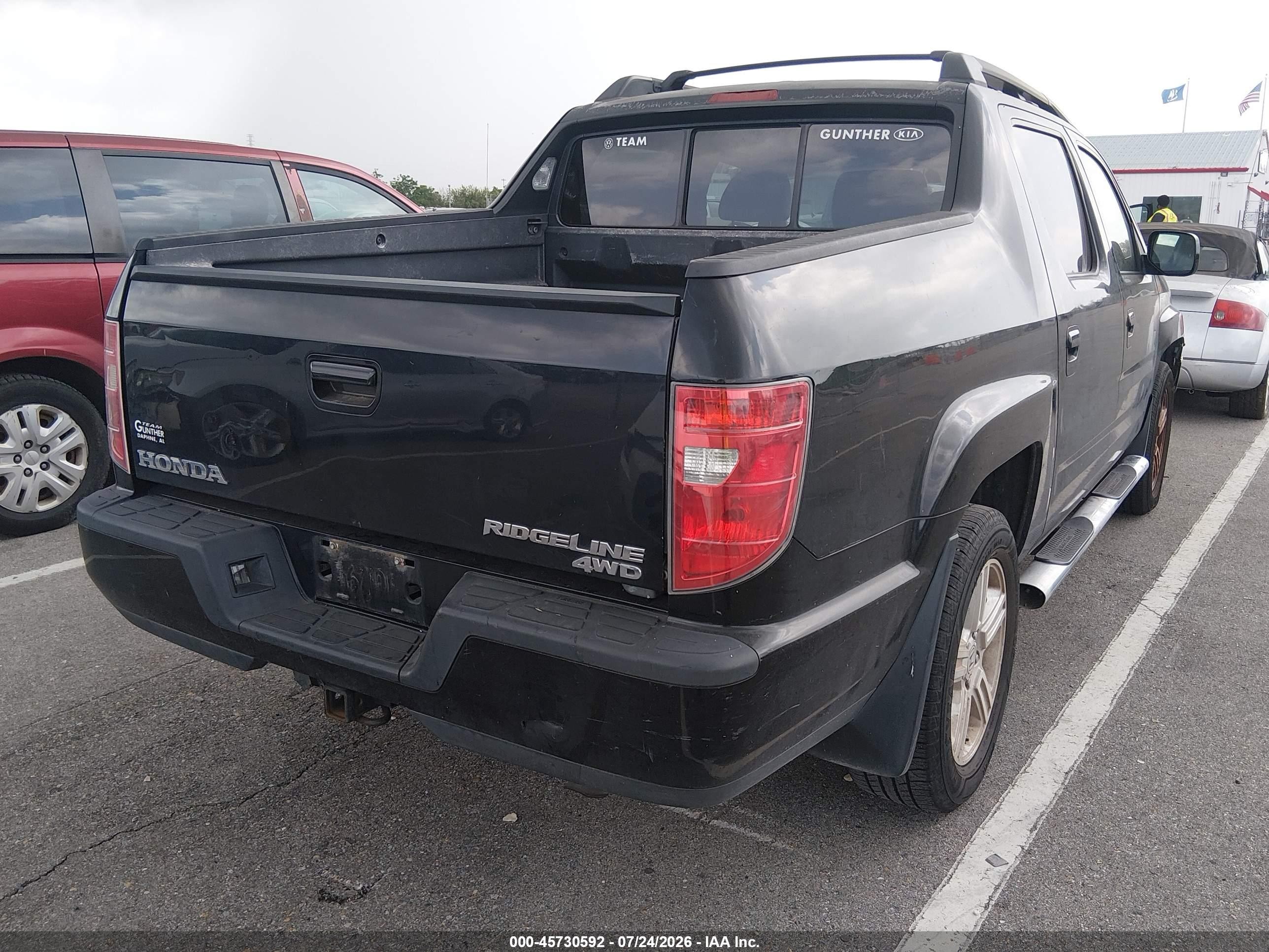 2011 Honda Ridgeline Rtl Black vin: 5FPYK1F55BB008323