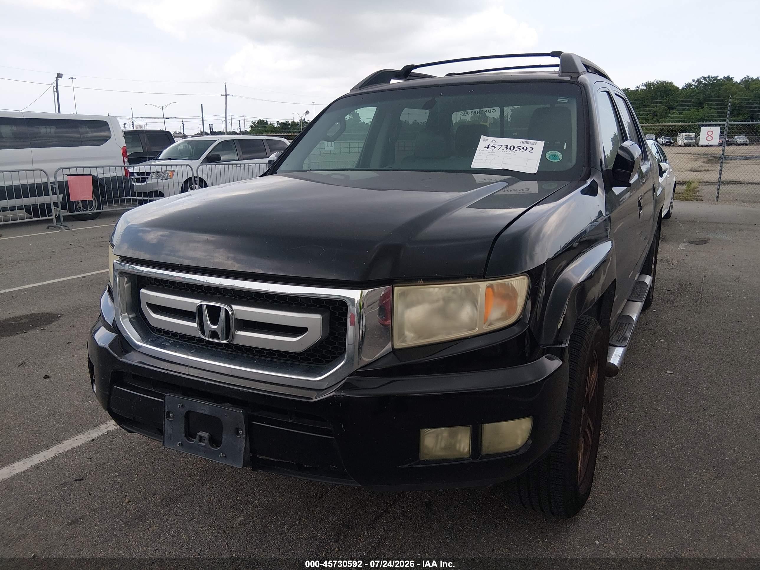 2011 Honda Ridgeline Rtl Black vin: 5FPYK1F55BB008323
