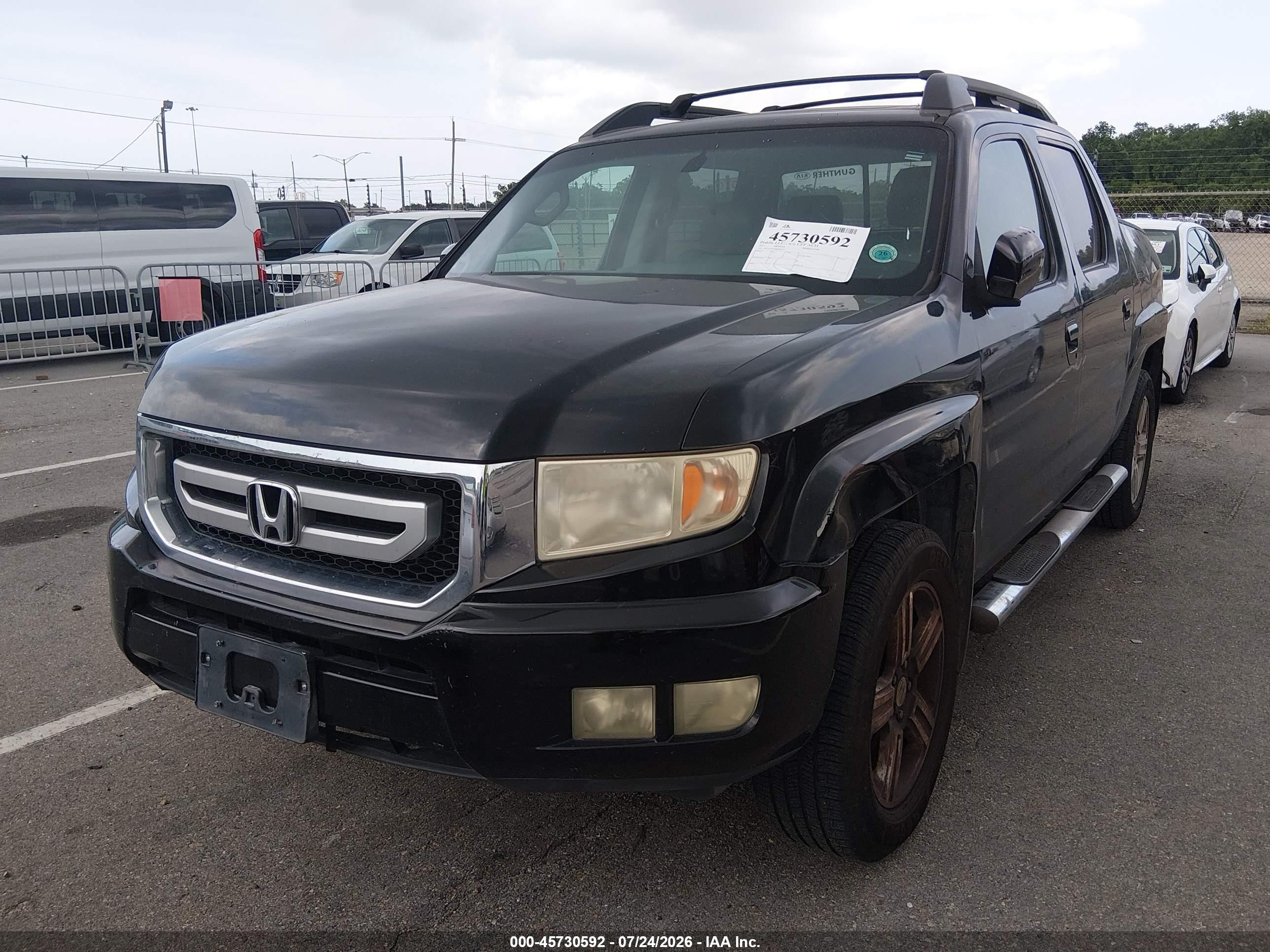 2011 Honda Ridgeline Rtl Black vin: 5FPYK1F55BB008323