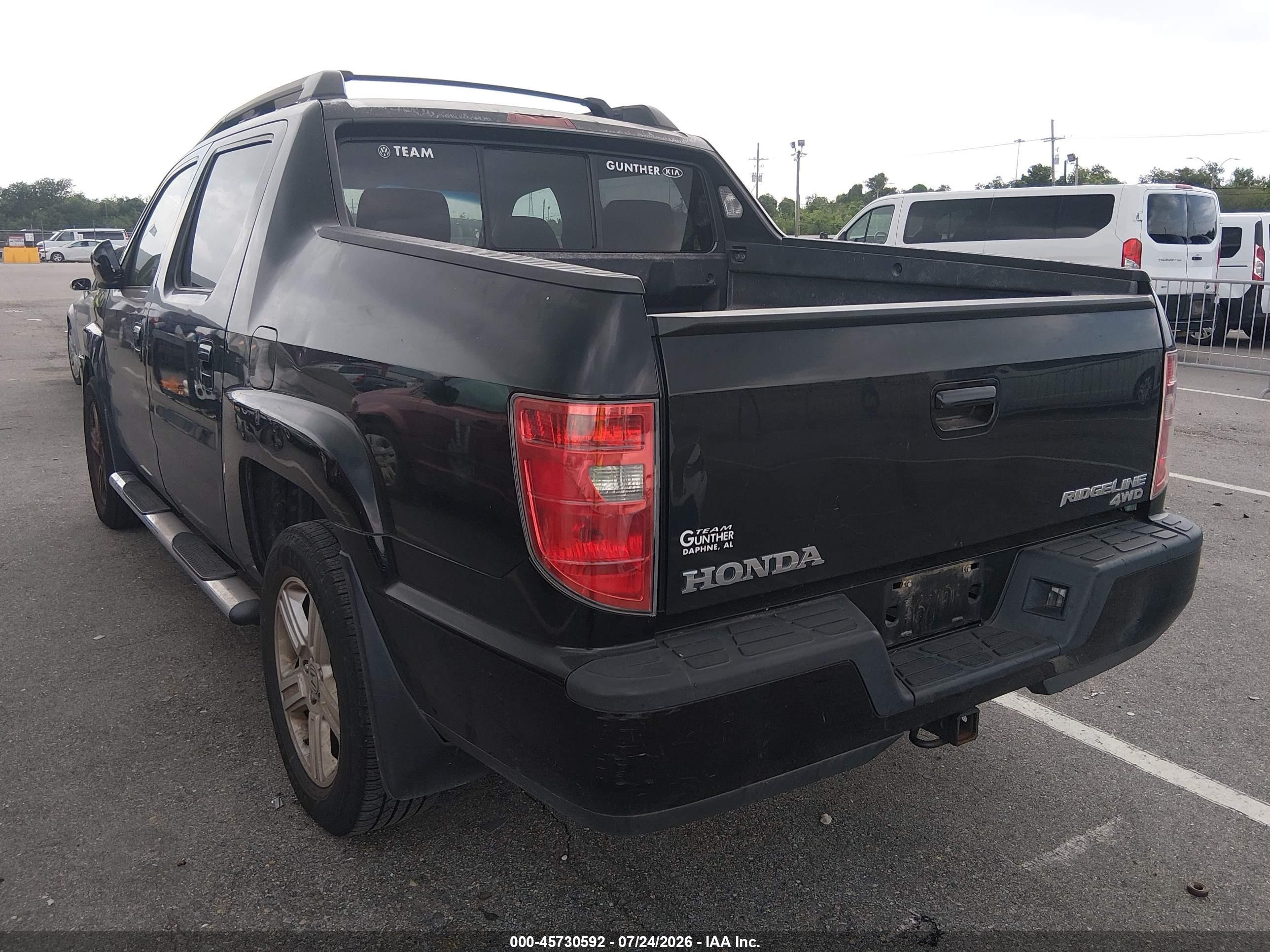 2011 Honda Ridgeline Rtl Black vin: 5FPYK1F55BB008323