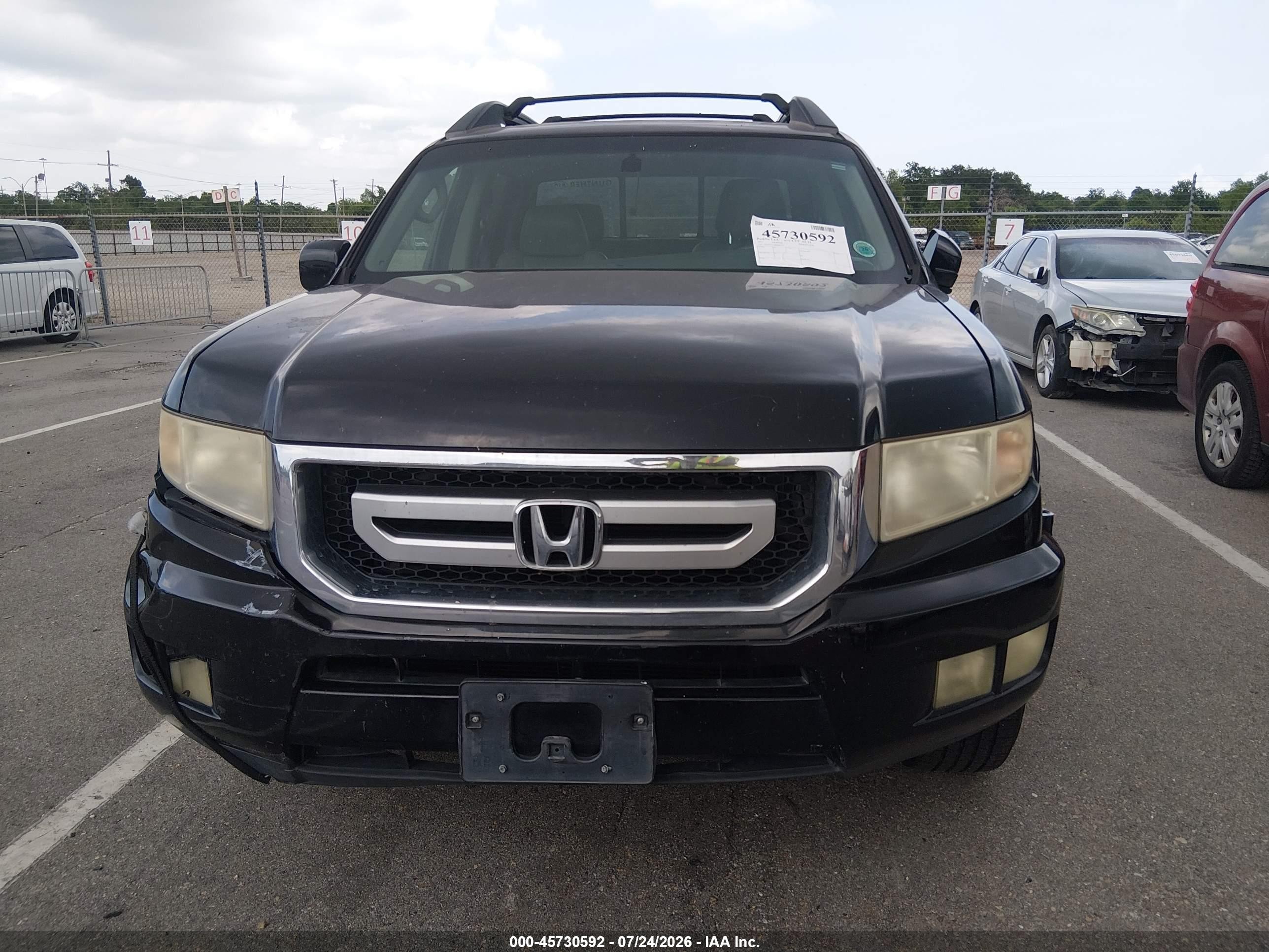 2011 Honda Ridgeline Rtl Black vin: 5FPYK1F55BB008323