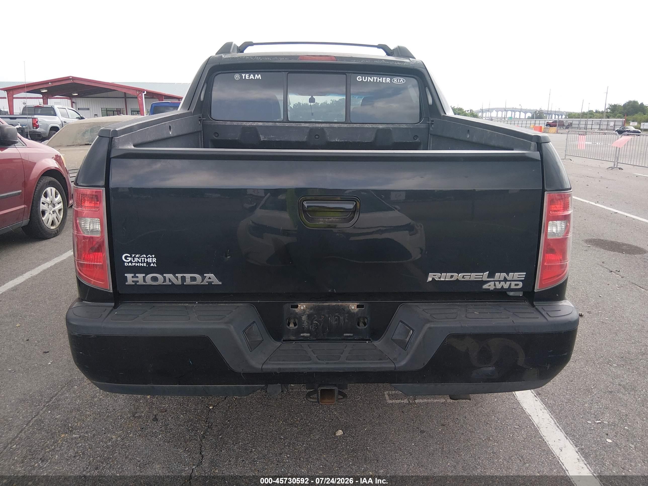 2011 Honda Ridgeline Rtl Black vin: 5FPYK1F55BB008323