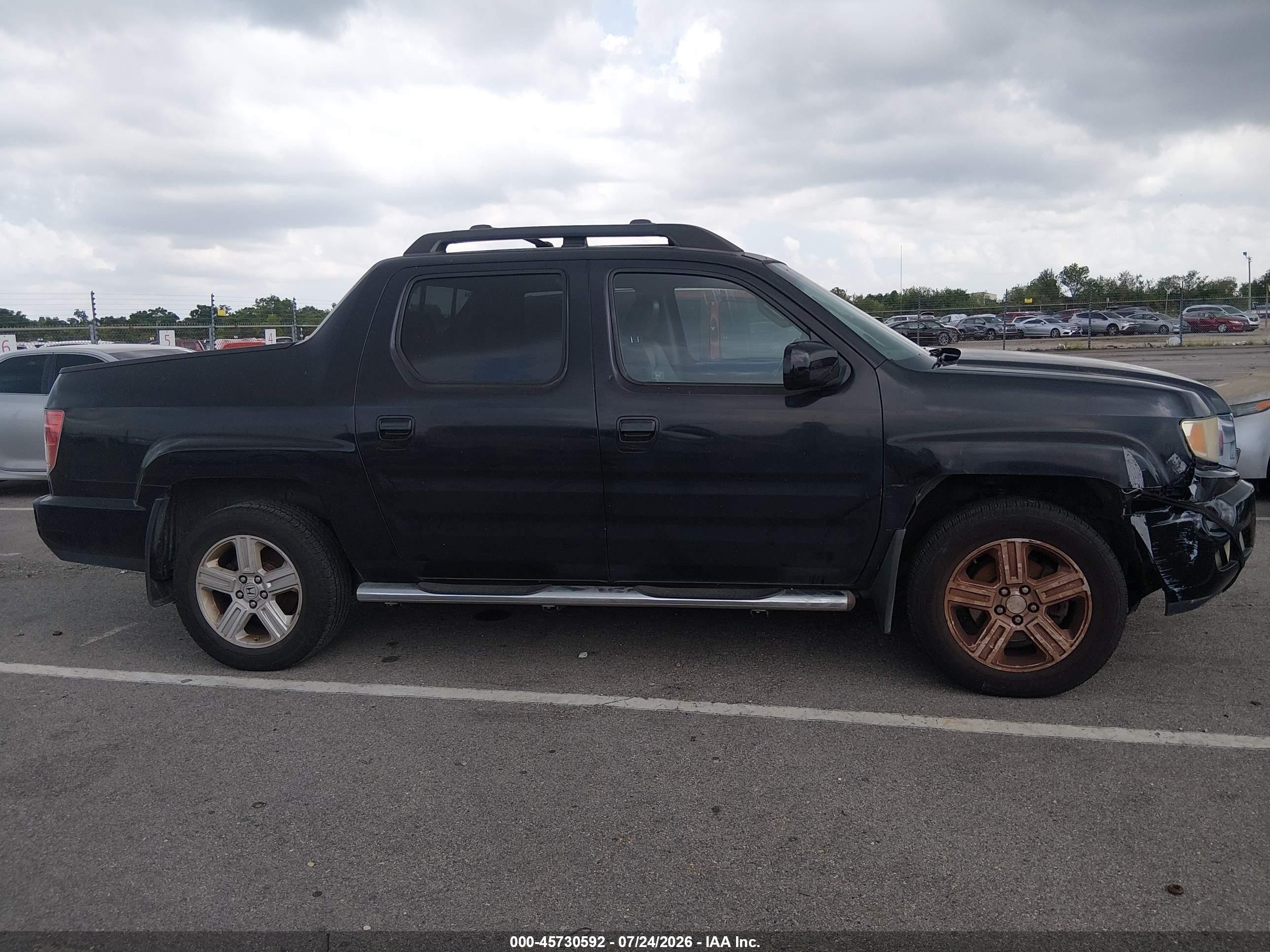 2011 Honda Ridgeline Rtl Black vin: 5FPYK1F55BB008323
