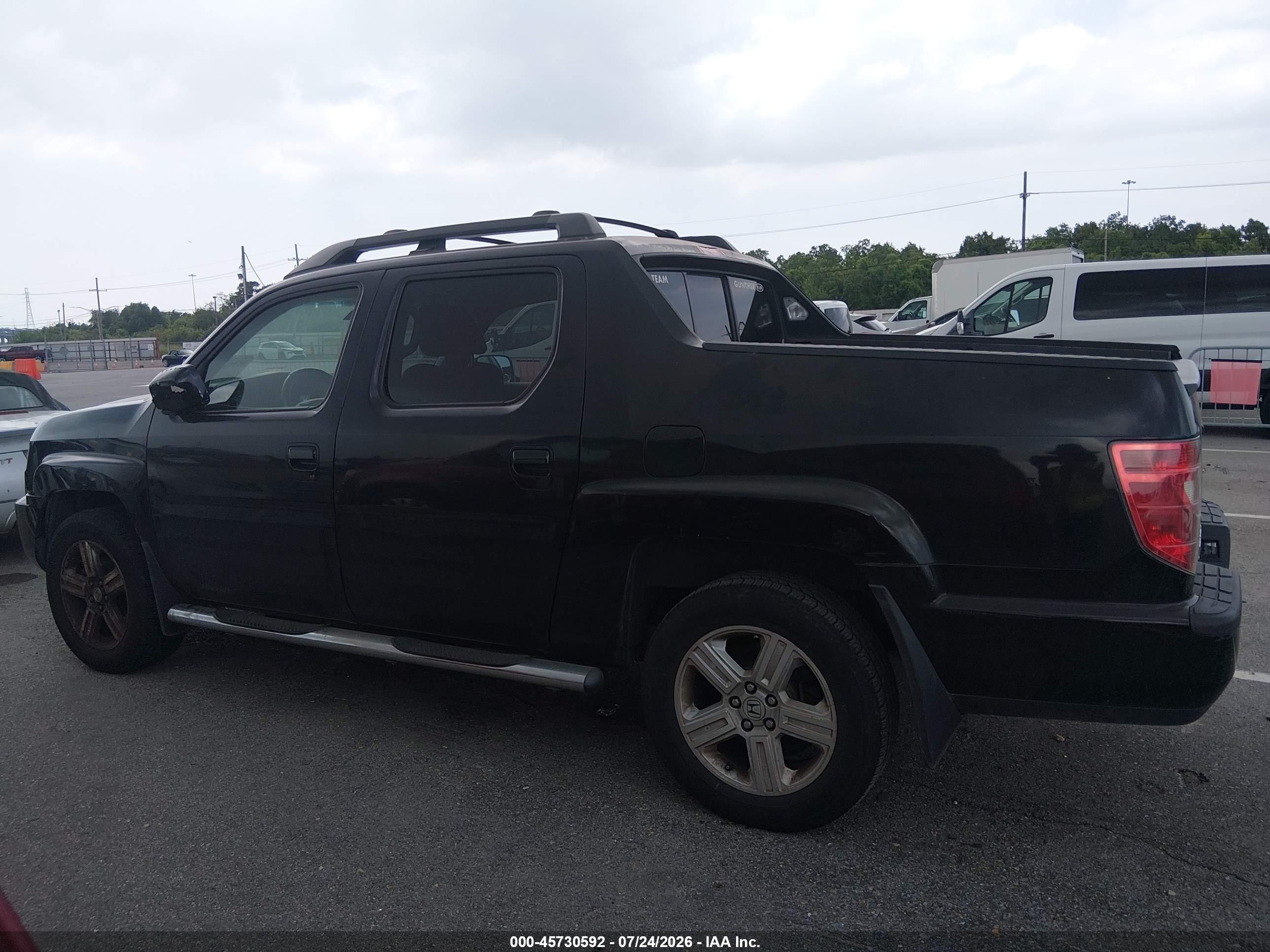 2011 Honda Ridgeline Rtl Black vin: 5FPYK1F55BB008323