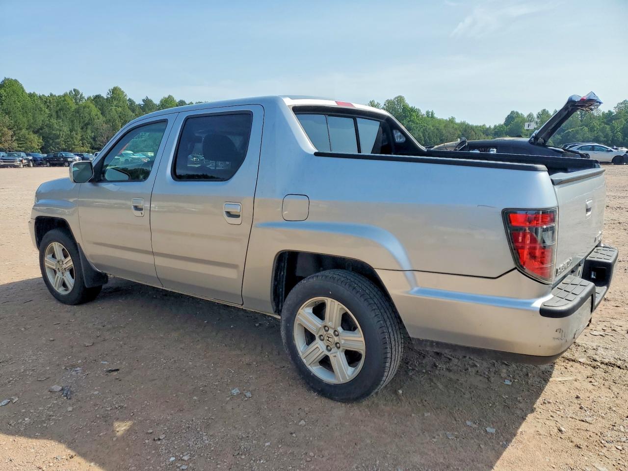 2012 Honda Ridgeline Rtl Серебряный vin: 5FPYK1F55CB452223