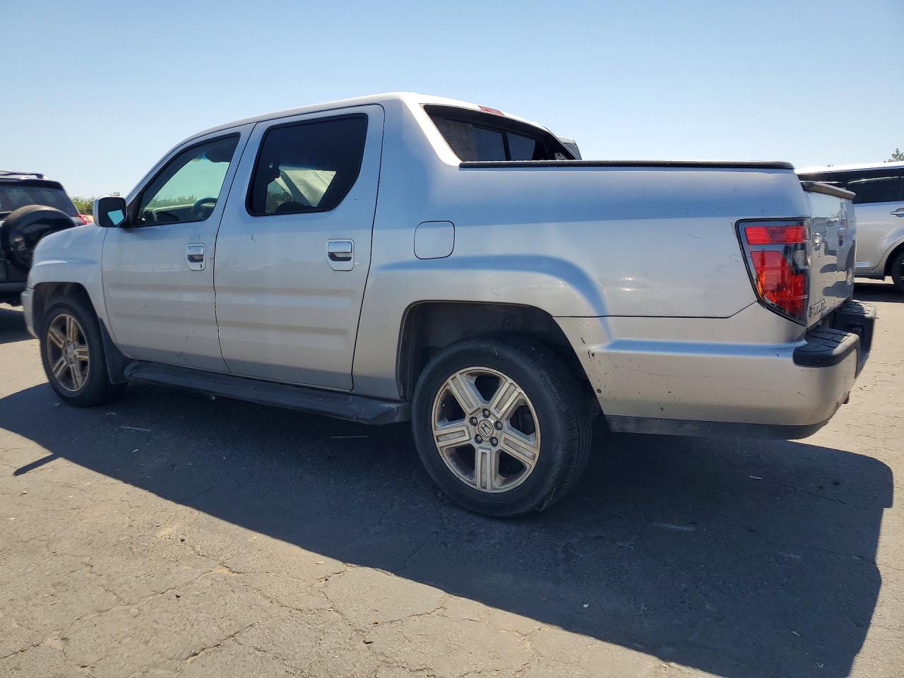 2012 Honda Ridgeline Rtl Silver vin: 5FPYK1F56CB454563