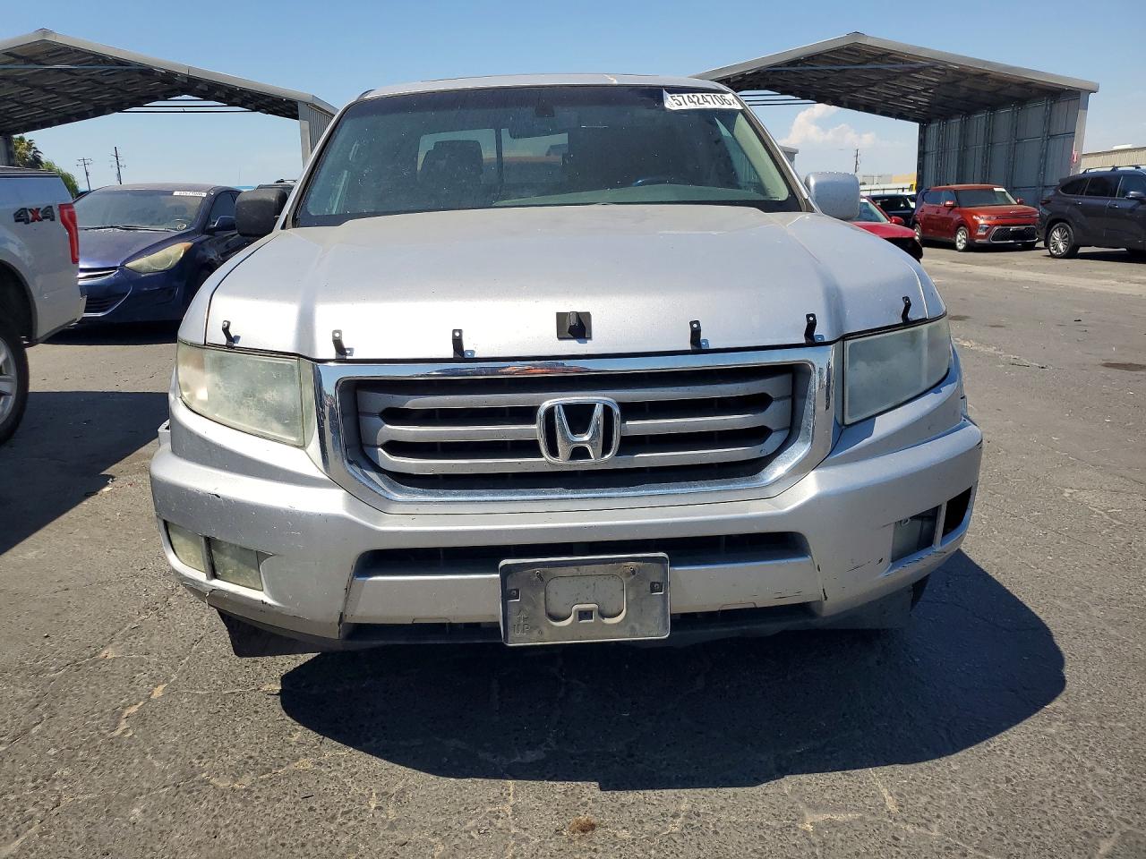 2012 Honda Ridgeline Rtl Silver vin: 5FPYK1F56CB454563