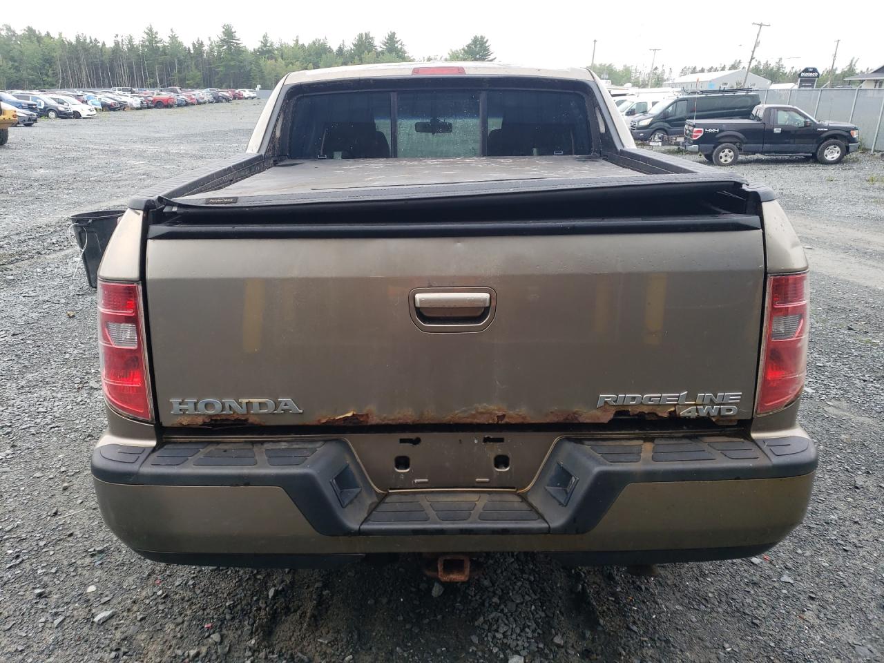 2010 Honda Ridgeline Rtl Gold vin: 5FPYK1F57AB501449 Damage: Right Tail Light, Broken, Replacement Required