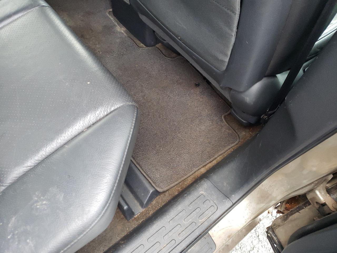 2010 Honda Ridgeline Rtl Gold vin: 5FPYK1F57AB501449 Damage: Right Rear Carpet, Stained, Permanent