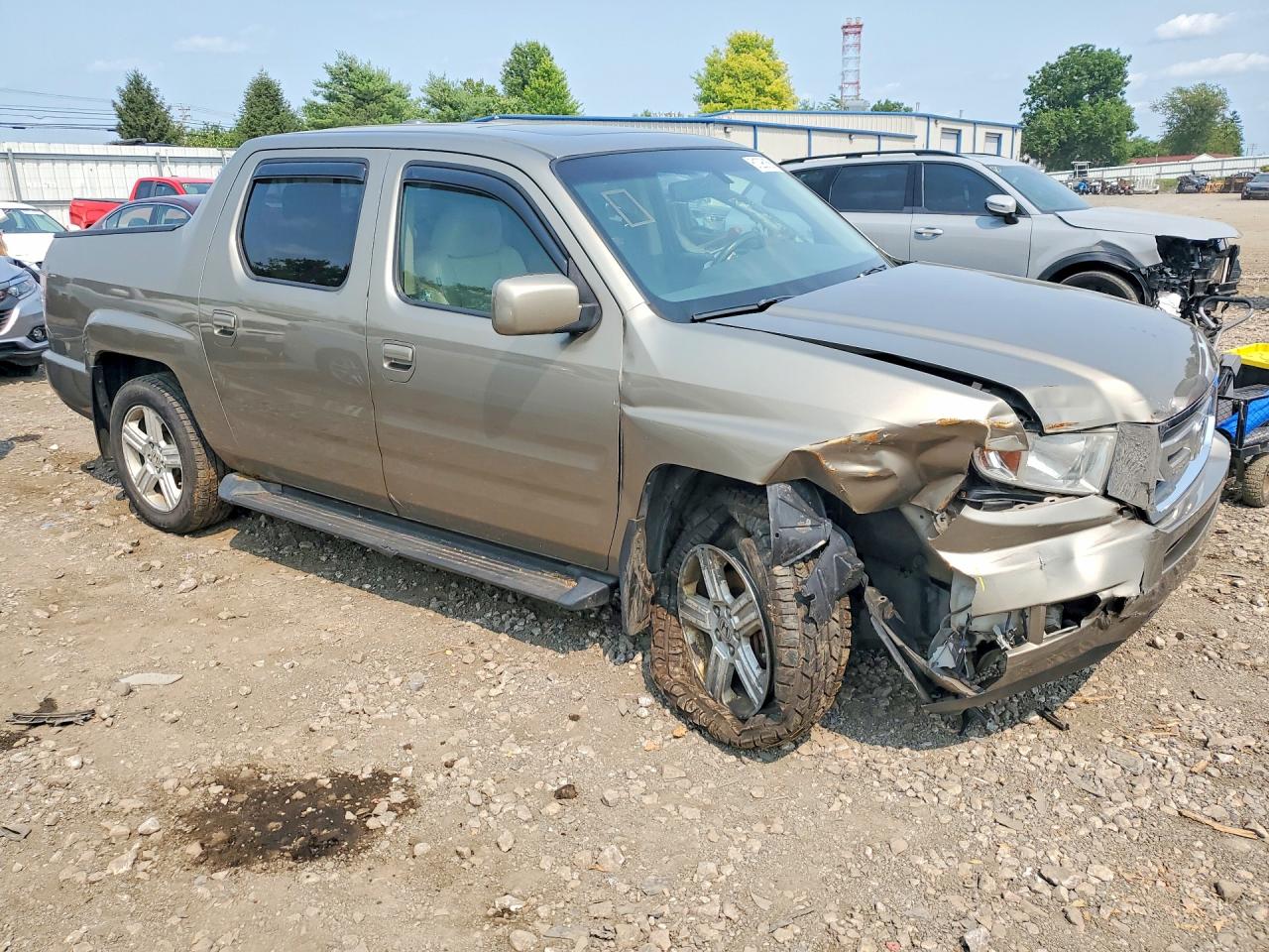 2011 Honda Ridgeline Rtl Tan vin: 5FPYK1F57BB002474