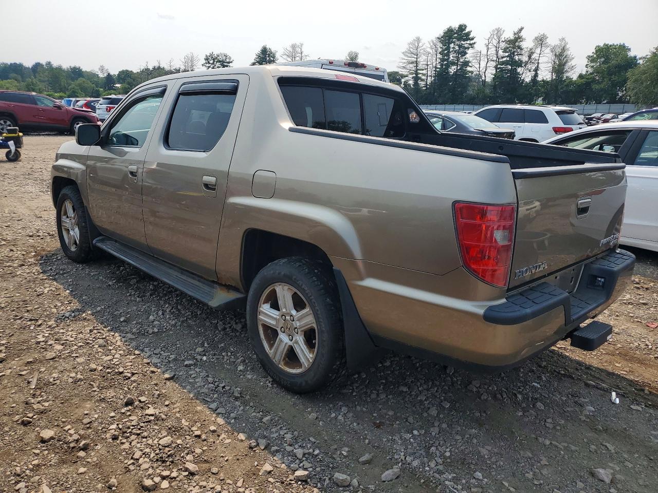 2011 Honda Ridgeline Rtl Tan vin: 5FPYK1F57BB002474