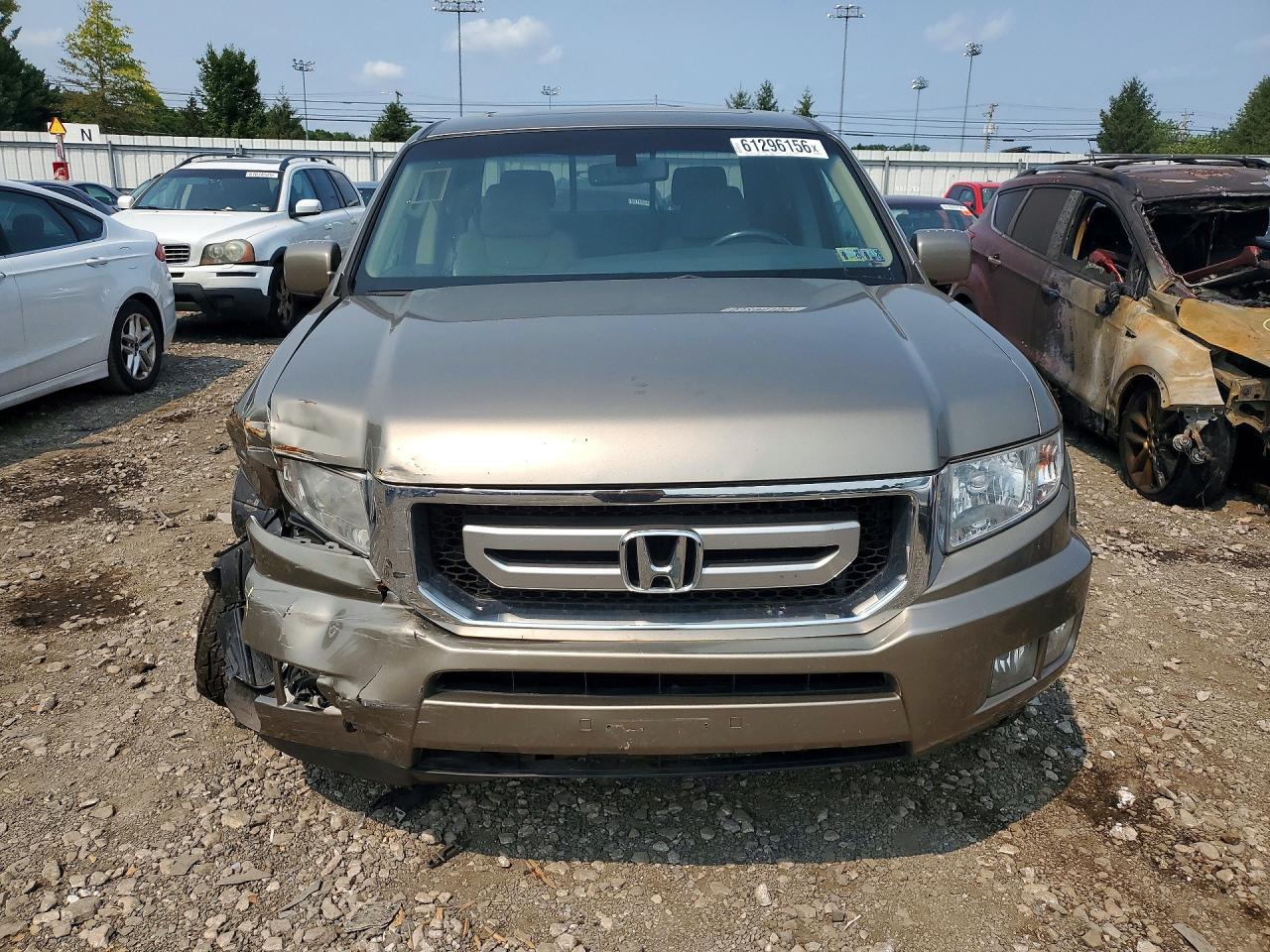 2011 Honda Ridgeline Rtl Tan vin: 5FPYK1F57BB002474