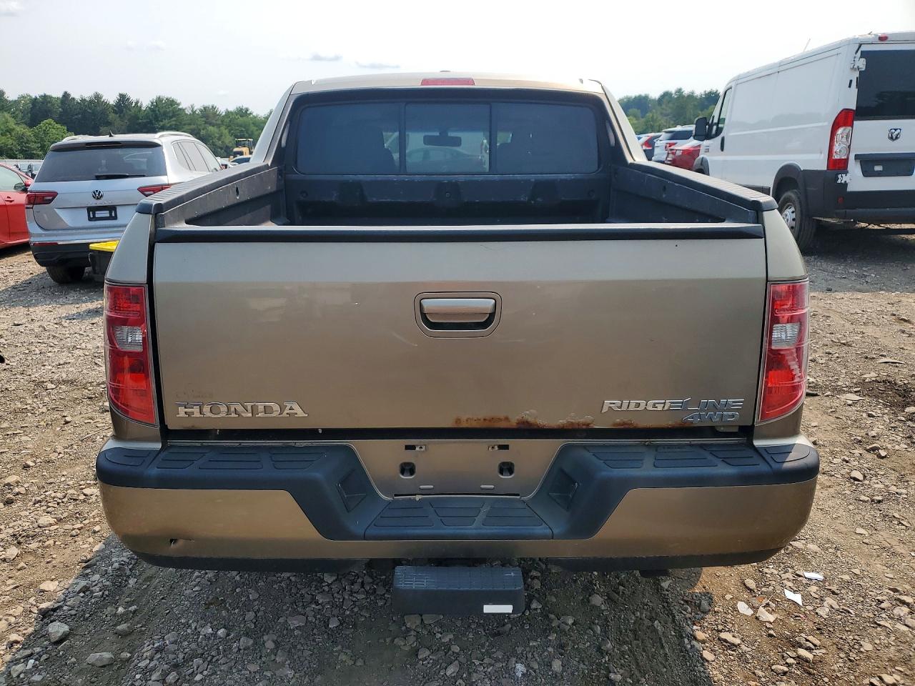 2011 Honda Ridgeline Rtl Tan vin: 5FPYK1F57BB002474